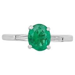 1.48tcw Oval Colombian Emerald & Tapered Baguette Diamond Platinum Ring
