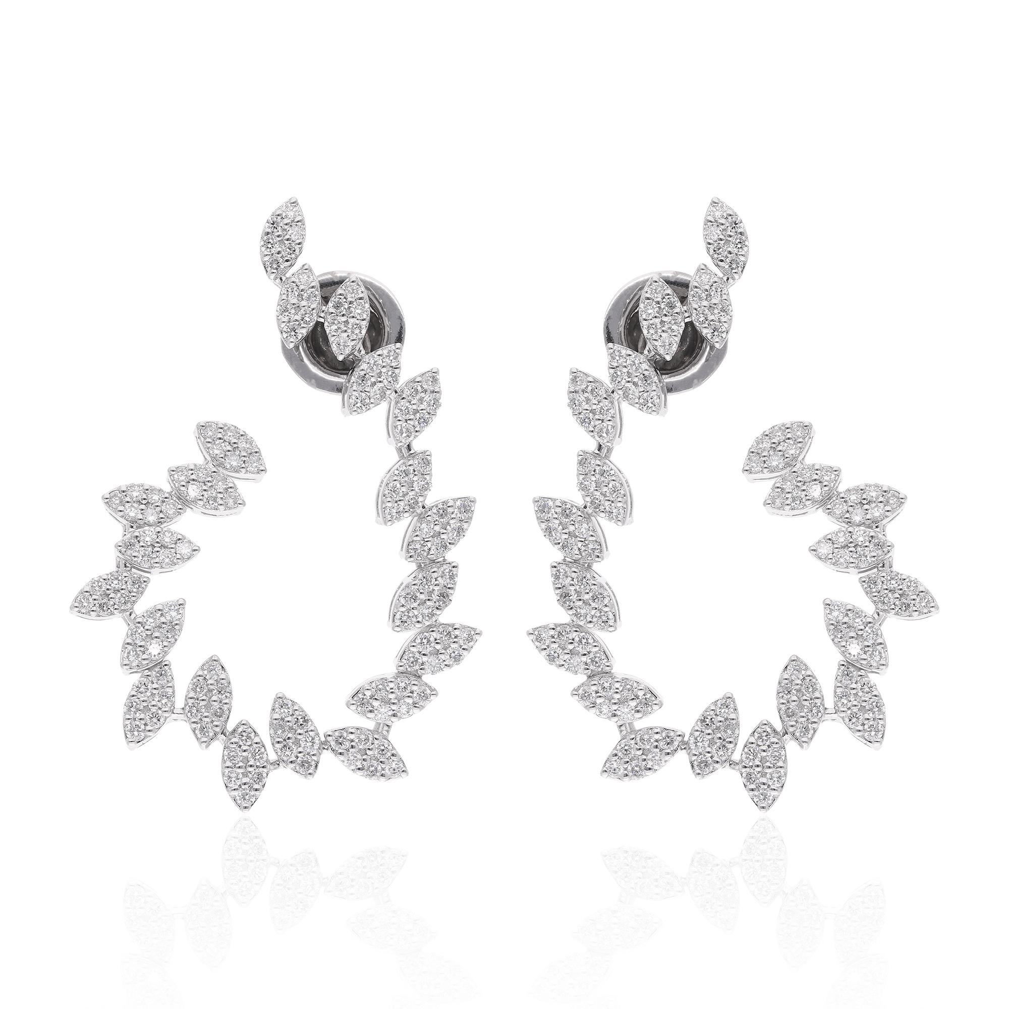 The earrings are crafted in 10 karat white gold, a precious metal that offers durability and a sophisticated look. The white gold setting provides a complementary backdrop for the diamonds, accentuating their beauty and enhancing their natural