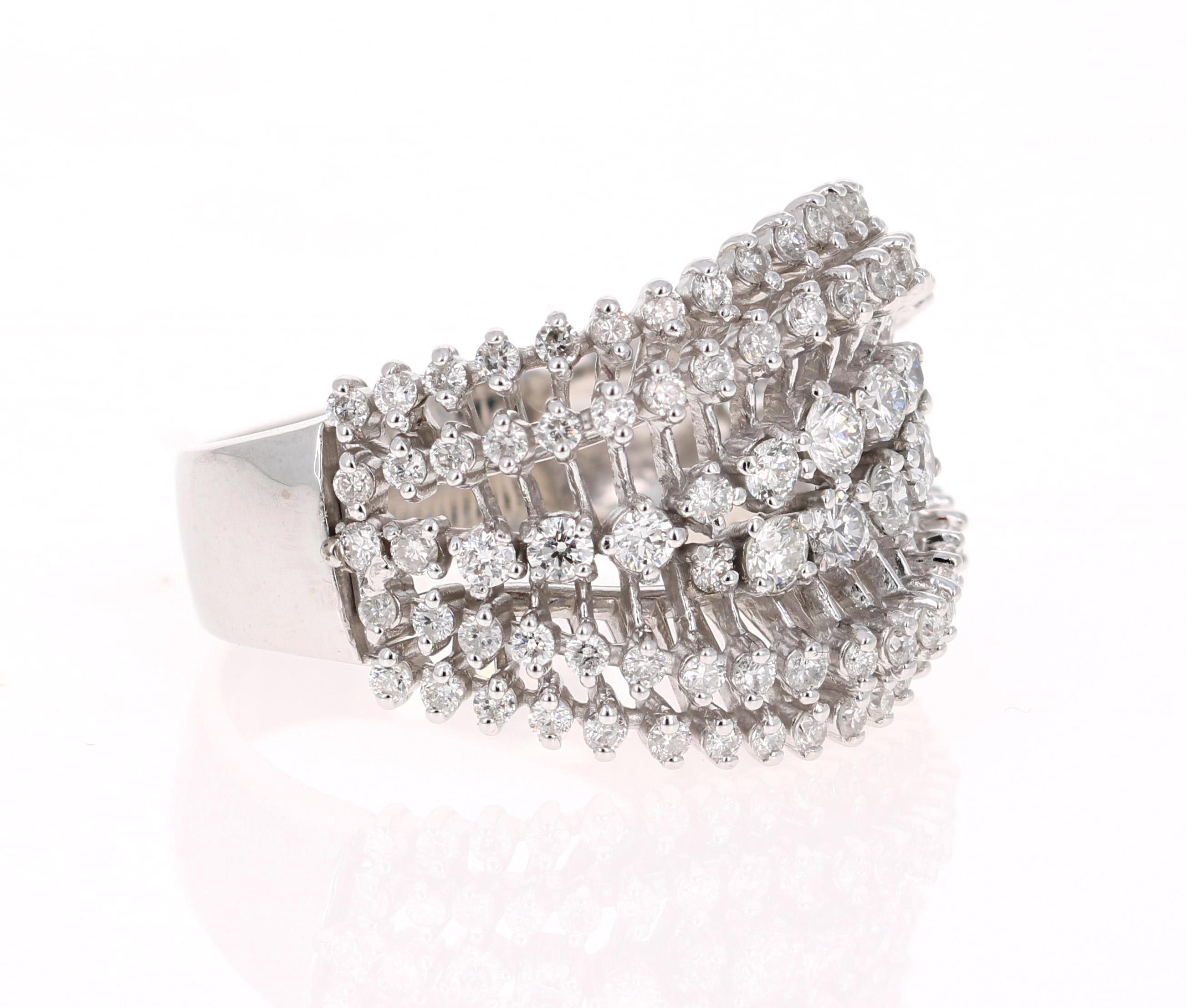 This ring has 110 Natural Round Cut Diamonds that weigh 1.49 Carats and has a clarity and color of SI-F.  
It is crafted in 14 Karat White Gold and has an approximate weight of 8.5 grams. 

The ring is a size 7 and can be re-sized at no additional
