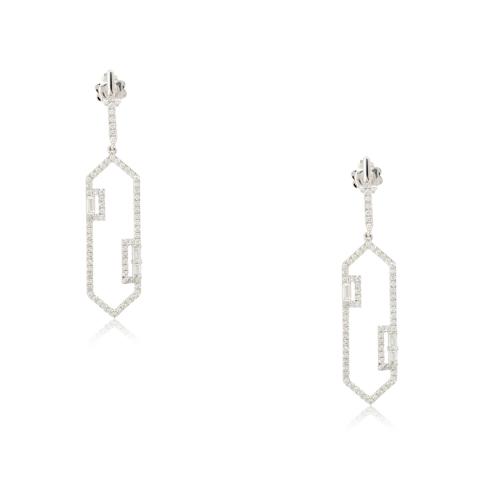 14k White Gold 1.49ctw Emerald Cut Diamond Drop Oblong Earrings

Material: 14k White Gold
Diamond Details: Diamonds are approximately 1.49ctw of Emerald and Round Brilliant cut Diamonds. There are 3 larger Emerald cut diamonds in each earring, along
