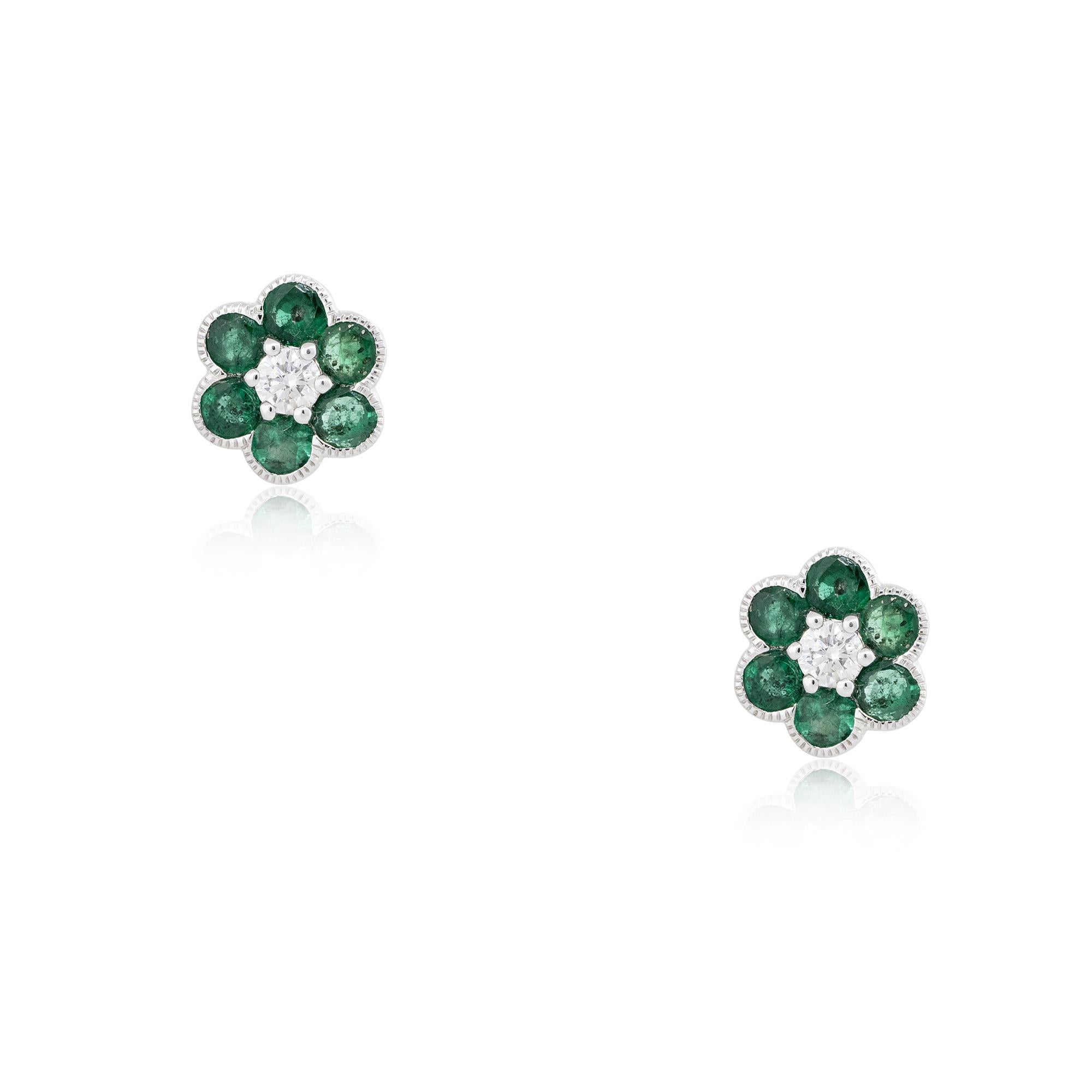 18k White Gold 1.49ct Emerald & Diamond Flower Earrings

Product: Emerald & Diamond Flower Earrings
Material: 18k White Gold
Gemstone/ Diamond Details: There are approximately 1.49 carats of Emerald Gemstones (12 Emeralds), and approximately 0.23