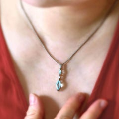 1.49 Carat Natural Paraiba Tourmaline and Diamond Pendant Made in Platinum