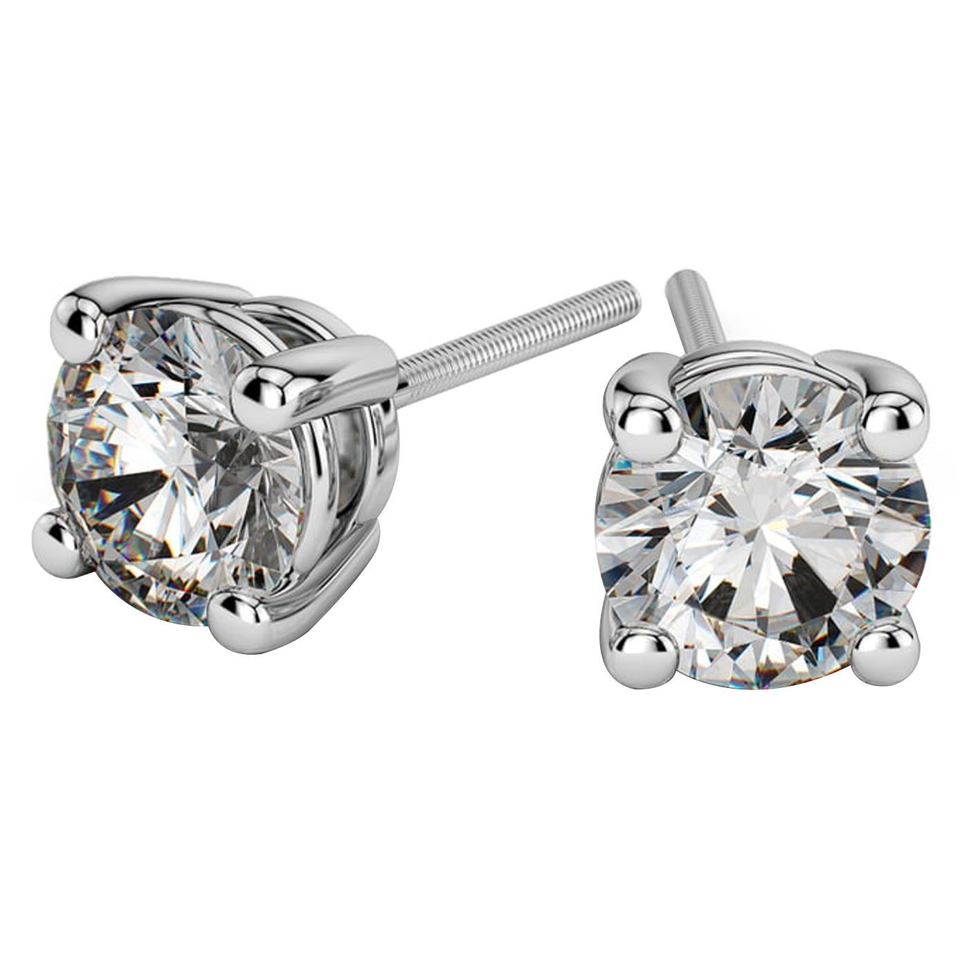 These Four-Prong Basket Style Natural Diamond Earrings are set with your choice of perfectly matched diamonds. An attractive alternative to traditional stud earrings, Basket settings lend all of their glory to the featured diamond within. The