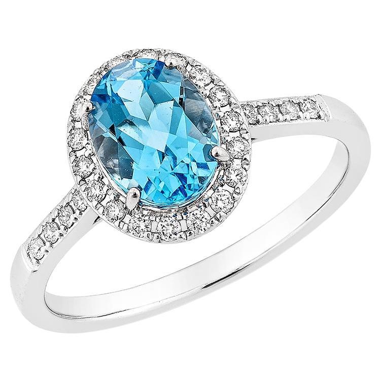 Bague fantaisie en or blanc 14 carats avec topaze bleue suisse de 1,49 carat et diamant blanc. en vente