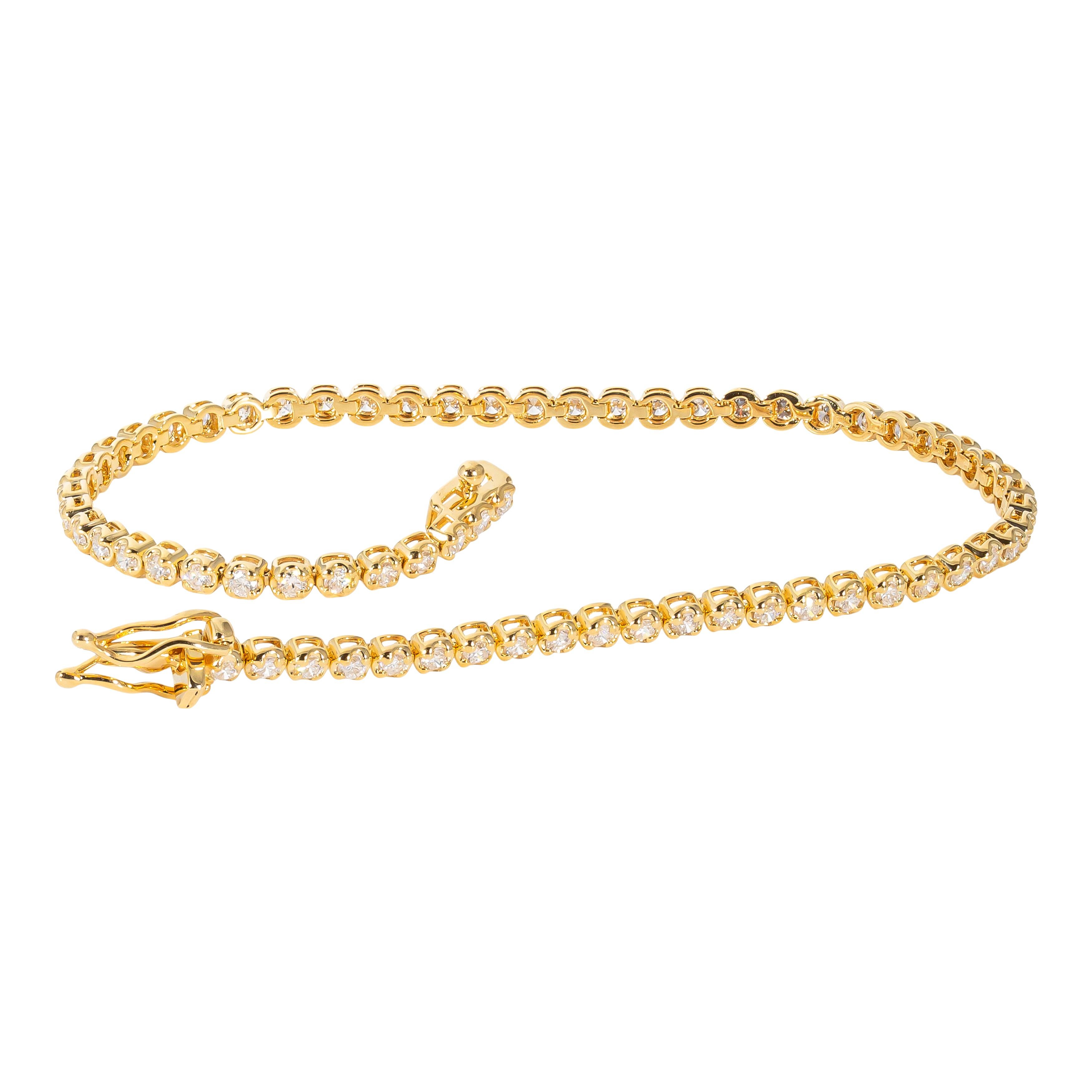 14k yellow gold bracelet containing prong set natural diamonds. The total weight of the diamonds is 1.49 carats. The color and clarity grades of the diamonds contained within the bracelet have been graded by our Graduate Gemologists as G-H, VS2-SI1,