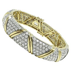 Bangle in oro bicolore con diamante da 14,93 carati