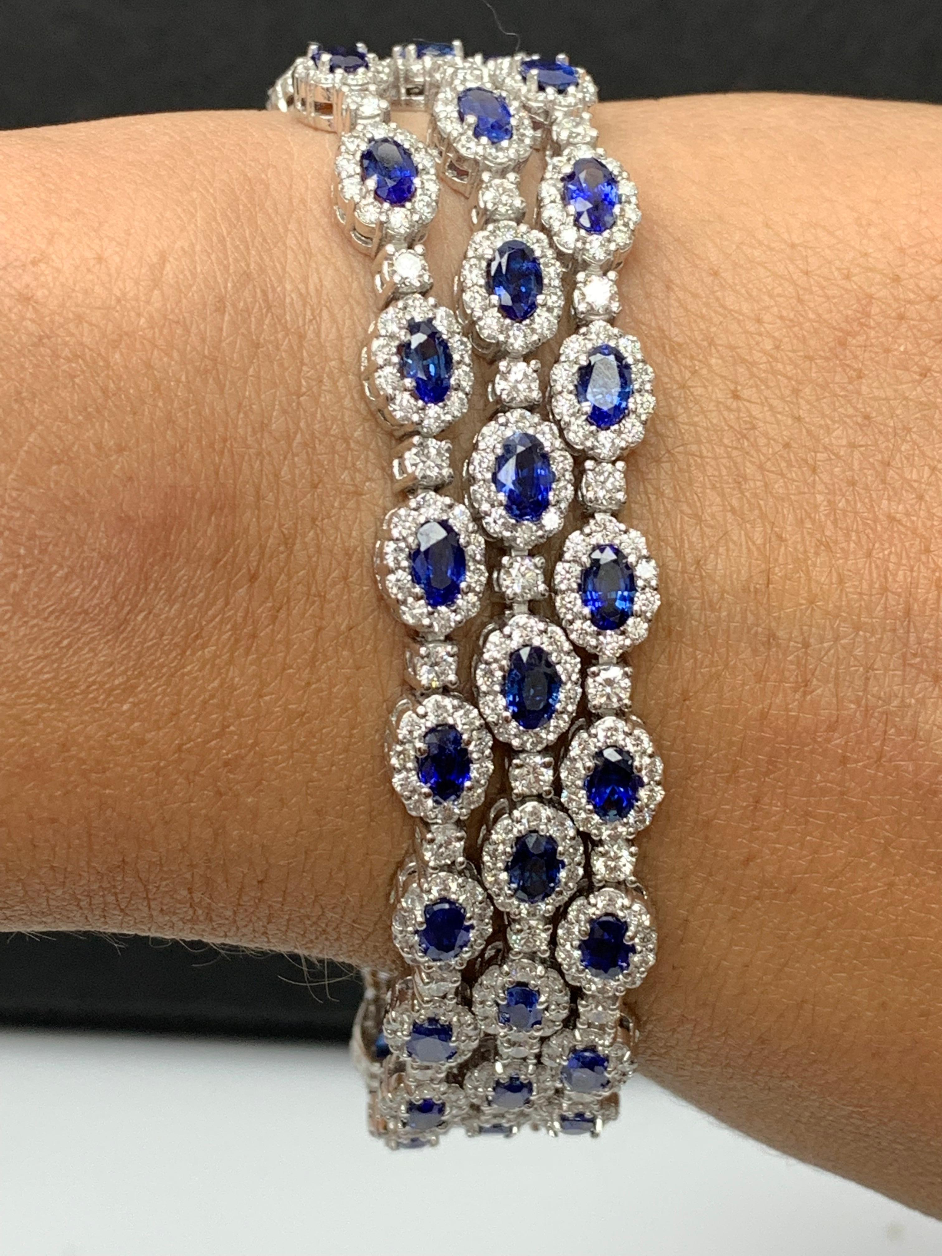 A beautiful Blue Sapphire and Diamond 3-row bracelet showcasing color-rich blue sapphires, surrounded by a single row of brilliant round diamonds. 51 Oval cut blue sapphires weigh 14.95 carats total; 561 accent diamonds weigh 10.97 carats total.