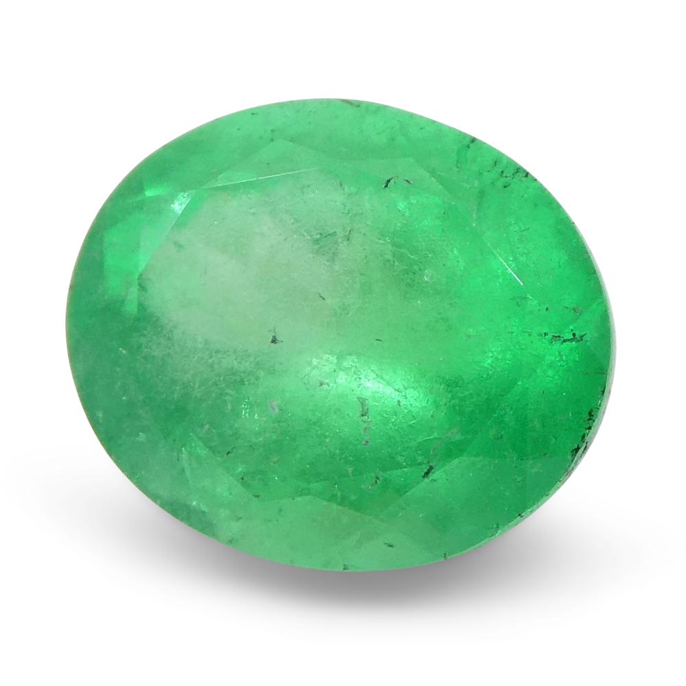 Brilliant Cut 1.49ct Oval Green Emerald from Colombia For Sale