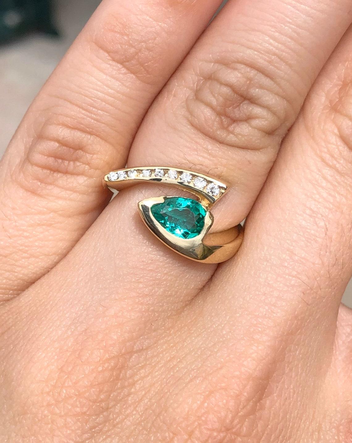 Modern 1.49tcw 14K Zambian Emerald Pear & Round Diamond Statement Bypass Ring  For Sale