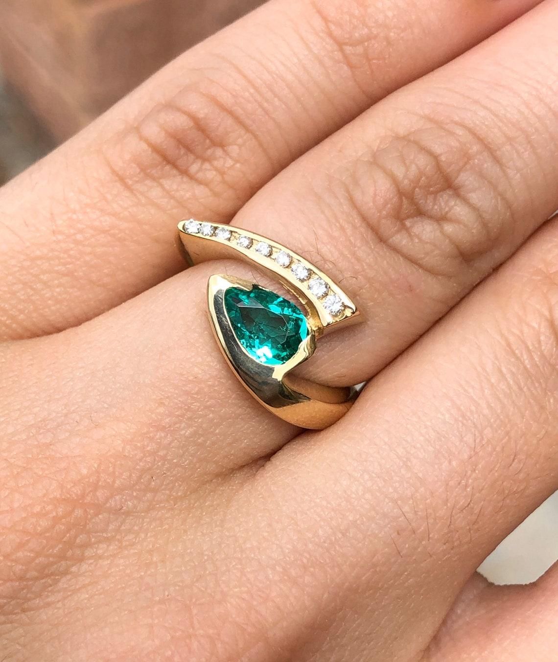 1.49tcw 14K Zambian Emerald Pear & Round Diamond Statement Bypass Ring  In New Condition For Sale In Jupiter, FL