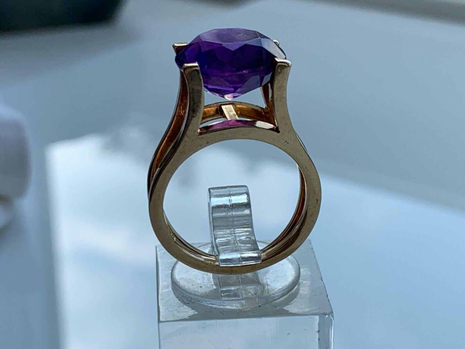 14ct Gold Scandinavian Modernist designer Ring
unknown Large tension set Purple Solitaire 
Stamped 585 BS

U.K Size i
U.S Size  4/12