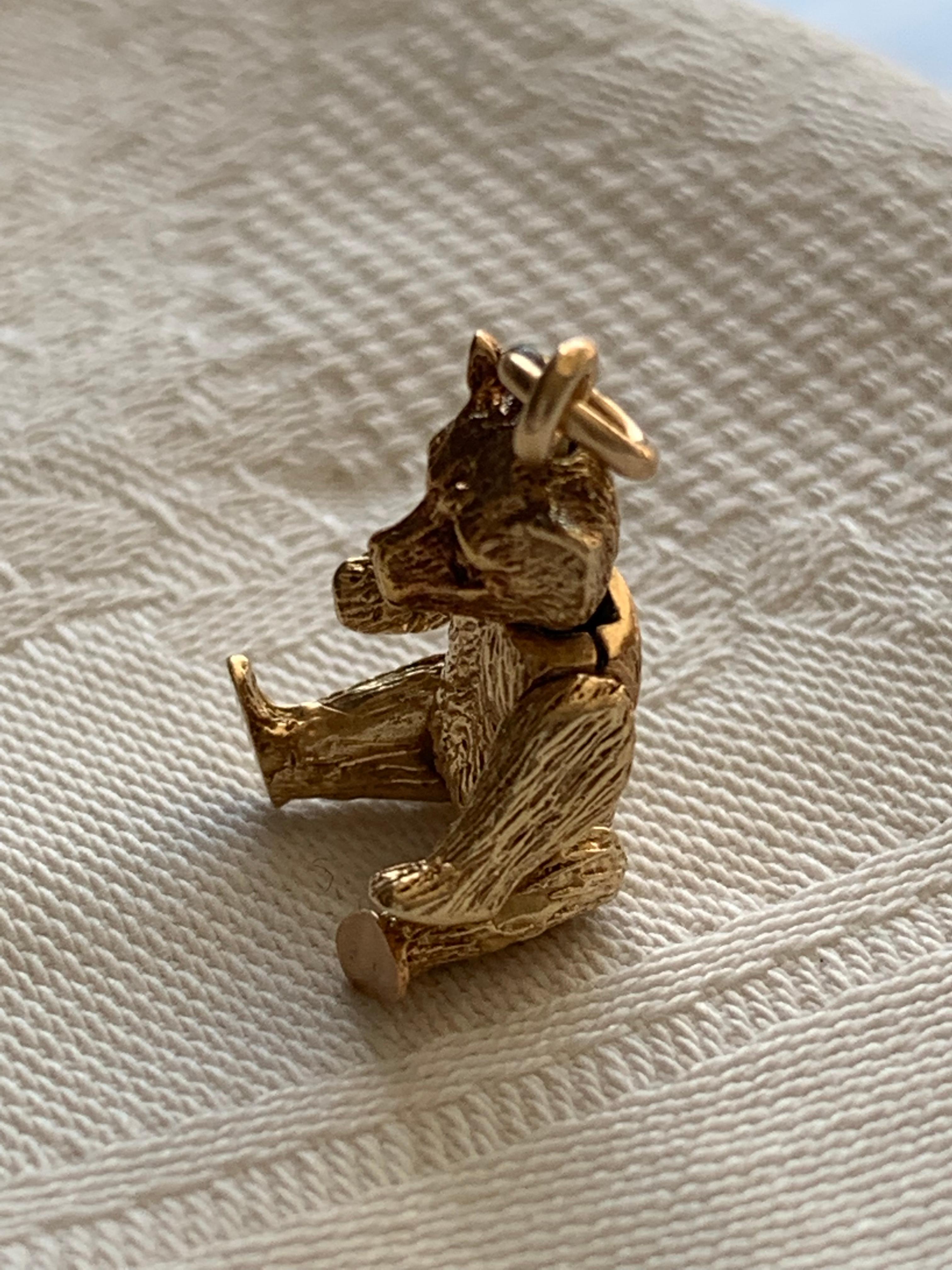 14ct 585 Gold Vintage Moveable Jointed Bear 
By Unknown Goldsmiths  - Dated 1949
Stamped 14k which is faded underfoot
Pendant Measures 3cm x 1.5 cm x 0.4cm 
Total Weight  6.91 grammes 