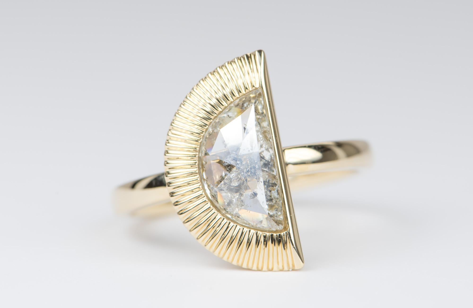 ♥  Solid 14K yellow gold ring set with a high luster, sparkly clear gray diamond in the center, bezel set with a half halo textured sunray design, giving the ring a celestial feeling
♥  The overall setting measures 9.05mm in width, 16.6mm in length,