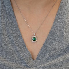 1.4ct Emerald Pendant with Natural Diamonds Accents: Solid 14K Gold, 7x5mm