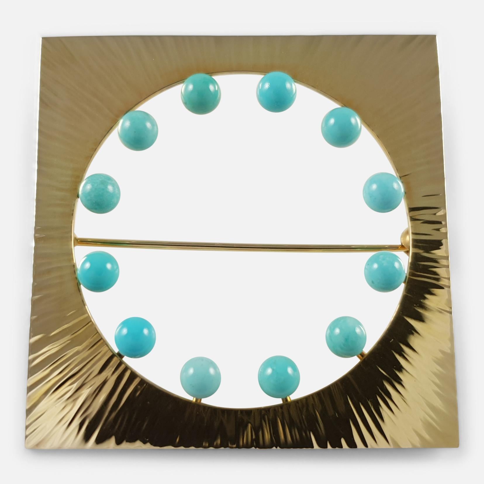 A mid-20th century Danish brooch crafted by Hans Hansen, featuring a 14ct yellow gold setting with an amazonite bead. 

The brooch is hallmarked in Edinburgh and marked with '585' for 14ct gold, indicating its gold purity.

• Measurement: