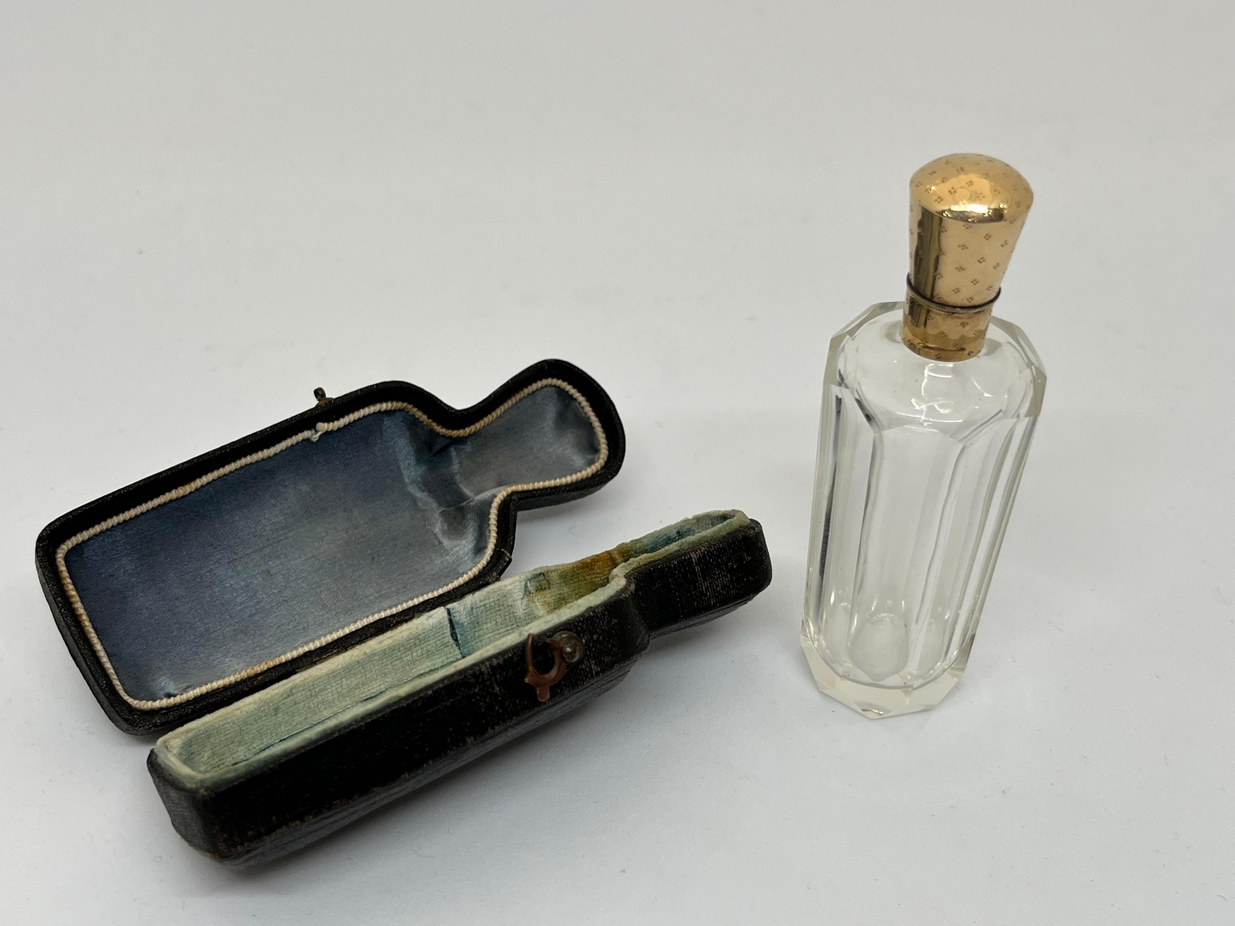 14ct Gold.

 

A mid-nineteenth century Dutch scent bottle, the faceted glass body mounted in14 carat gold, the hinged cap decorated with delicate quatrefoil design, opens to reveal a well-fitting stopper, presented in original satin-lined