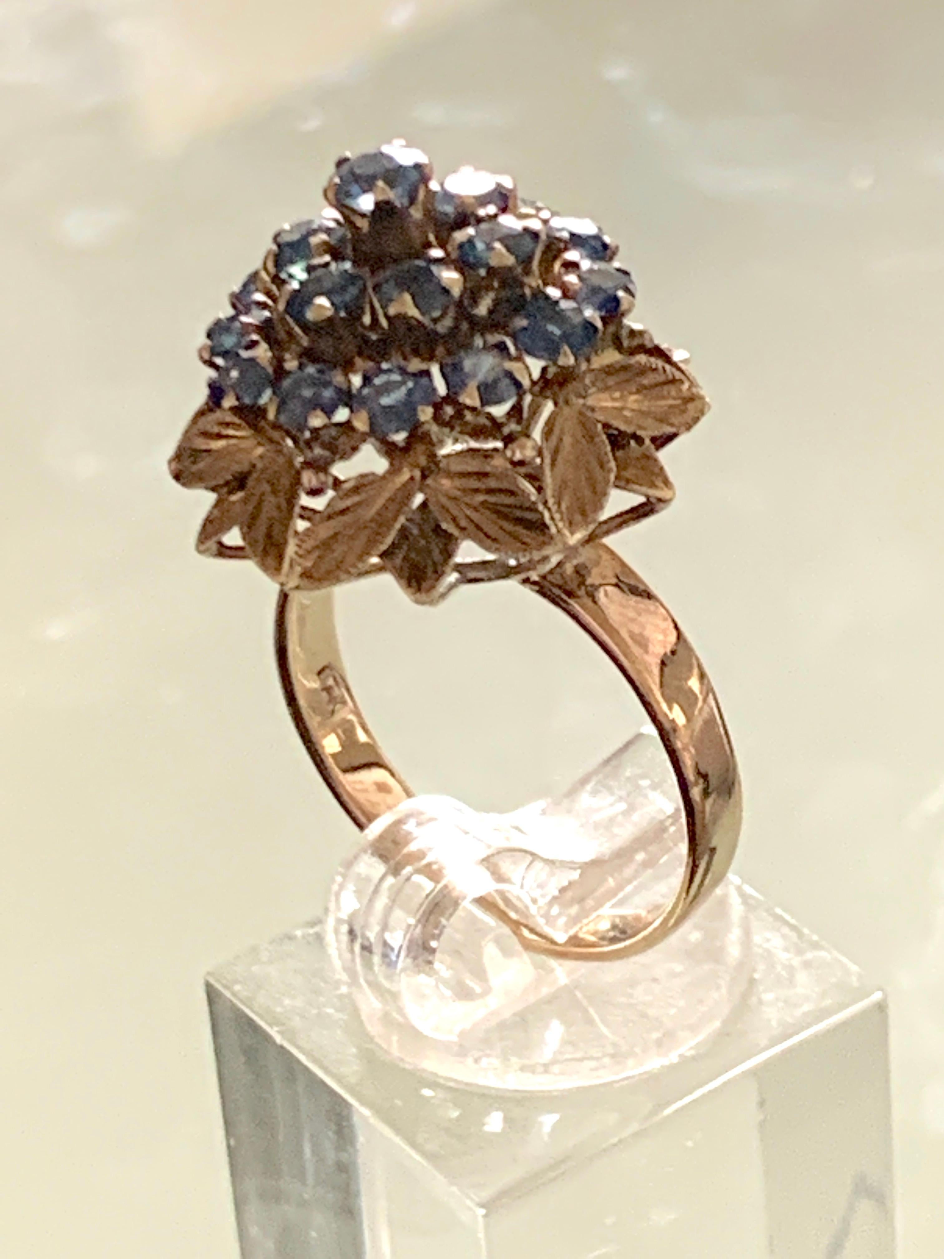 14ct Gold (2 Carat ) Blue precious gemstone Cocktail Ring 
Stamped 14k inside band
Origin - U.S.A 
Dated Pre 1950s
Weight 4.49 grams

Ring Size 18mm inner diameter = 55.9 mm circumference
U.K P 1/2
U.S 7 3/4

The stones register as sapphires on the