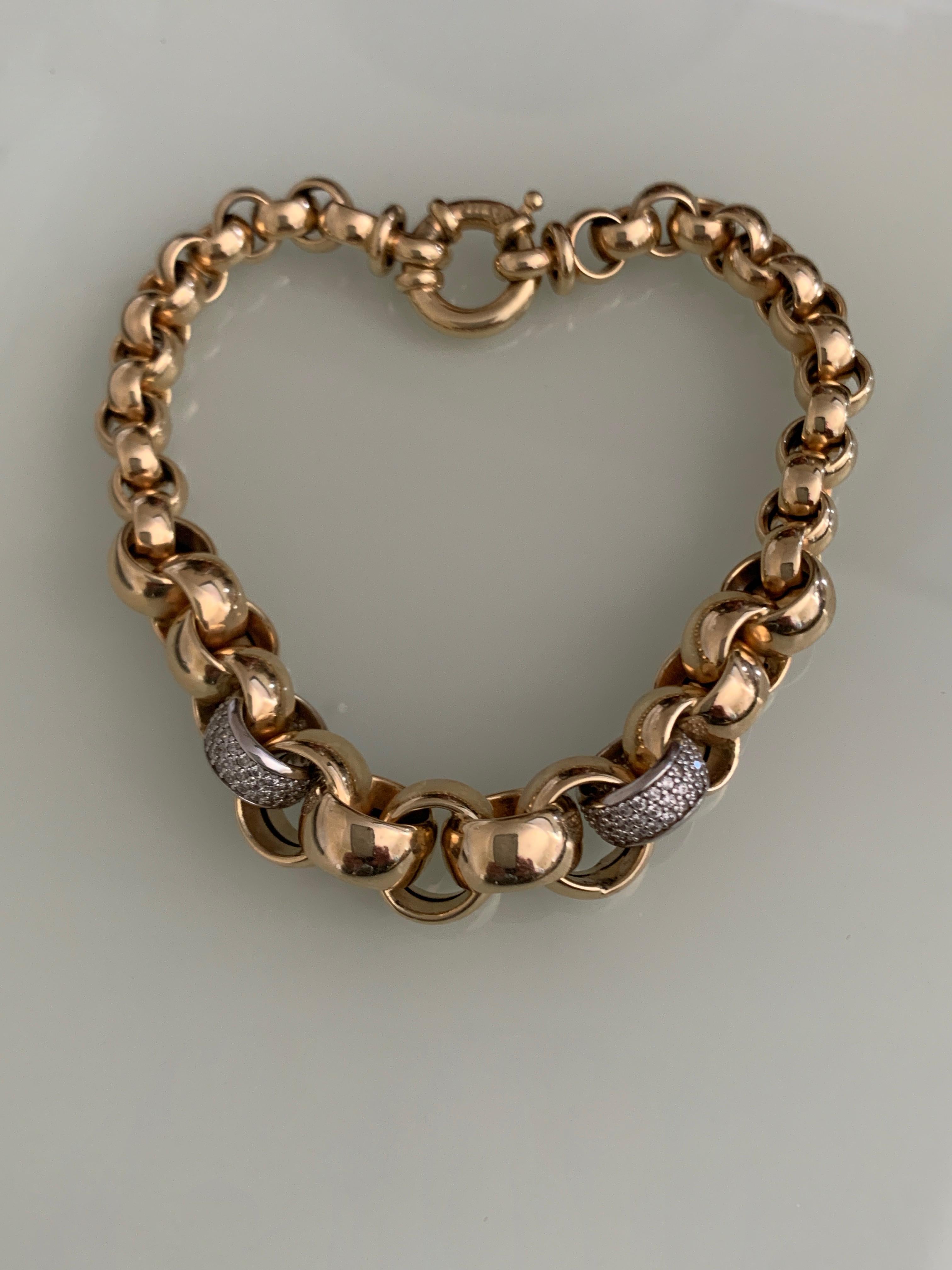 14ct 585 Gold Graduating Rolo Link Bracelet
with two full 0.84 Carat Pave set natural diamond Links .

Each Diamond measures 1mm = 0.05 carat
There are 84 diamonds in each link 
which amounts to 0.42 Carats in each link 
Total being 0.84 Carat