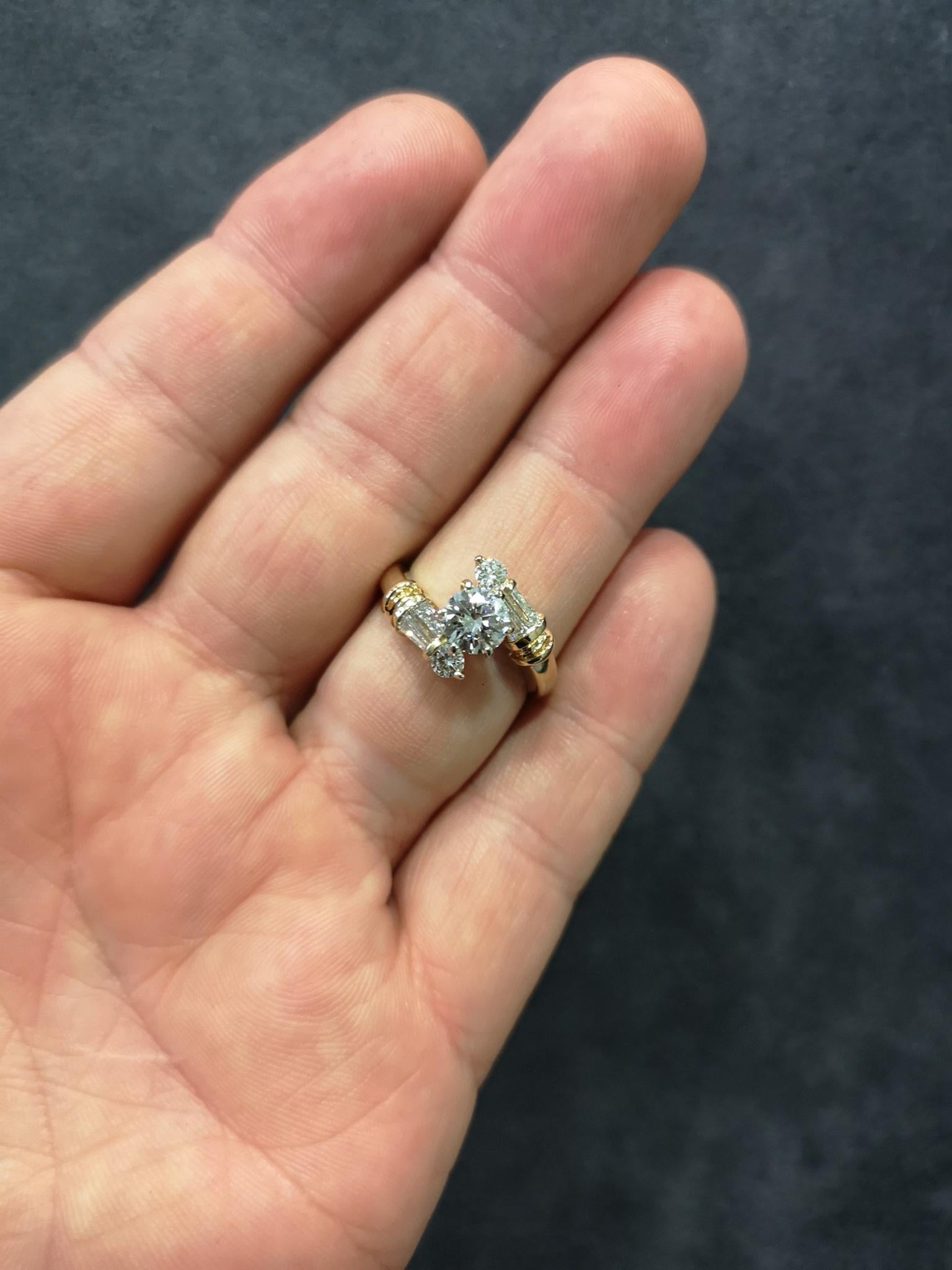 Modern 14 Carat Gold Diamond Solitaire Twist Engagement Ring For Sale