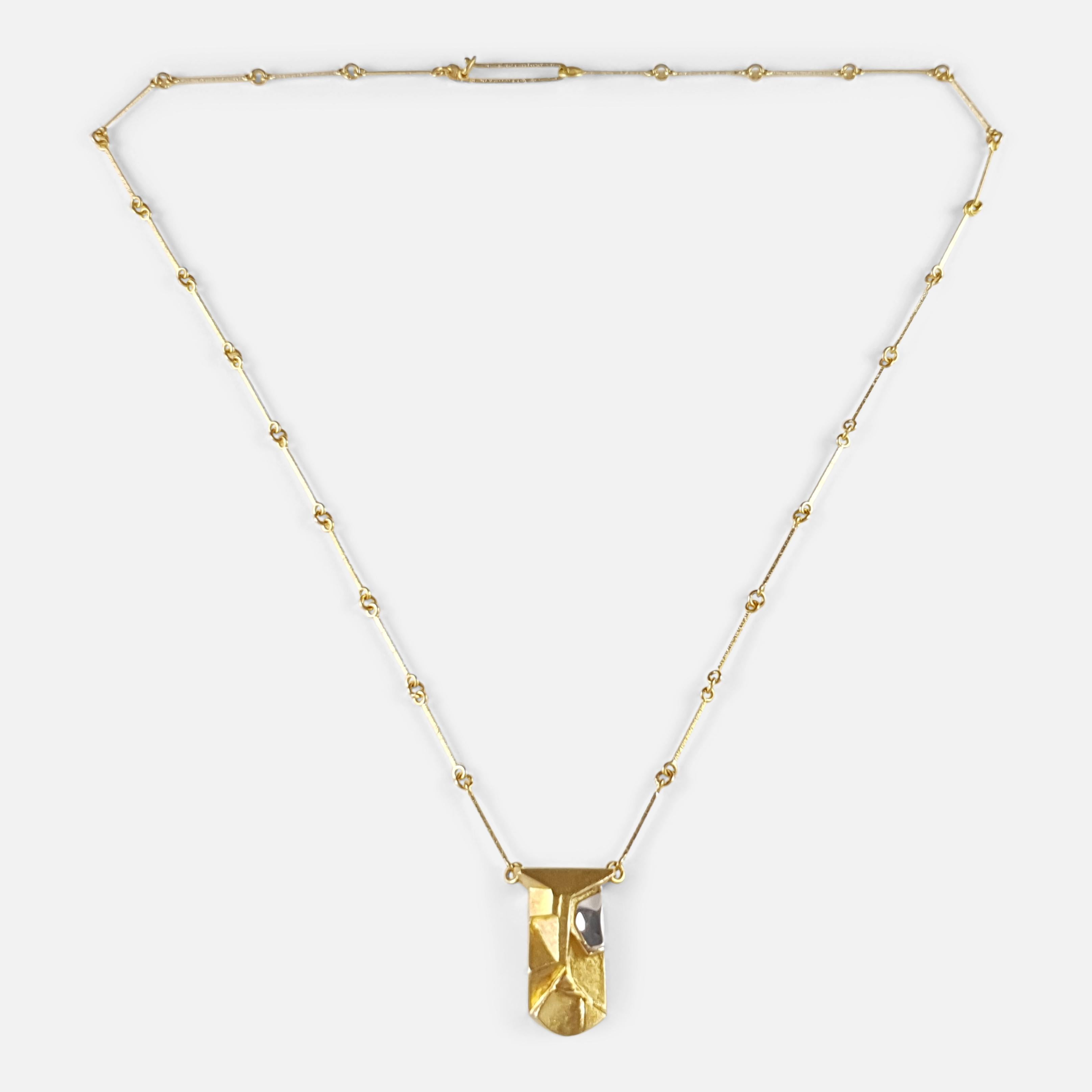 A Finnish 14ct yellow and white gold pendant necklace by Lapponia.

The necklace is hallmarked with the Lapponia makers mark, common control mark '585' to denote 14 carat gold, Finnish nation mark, and date code 'F9' for 2007.

Period: - Early 21st
