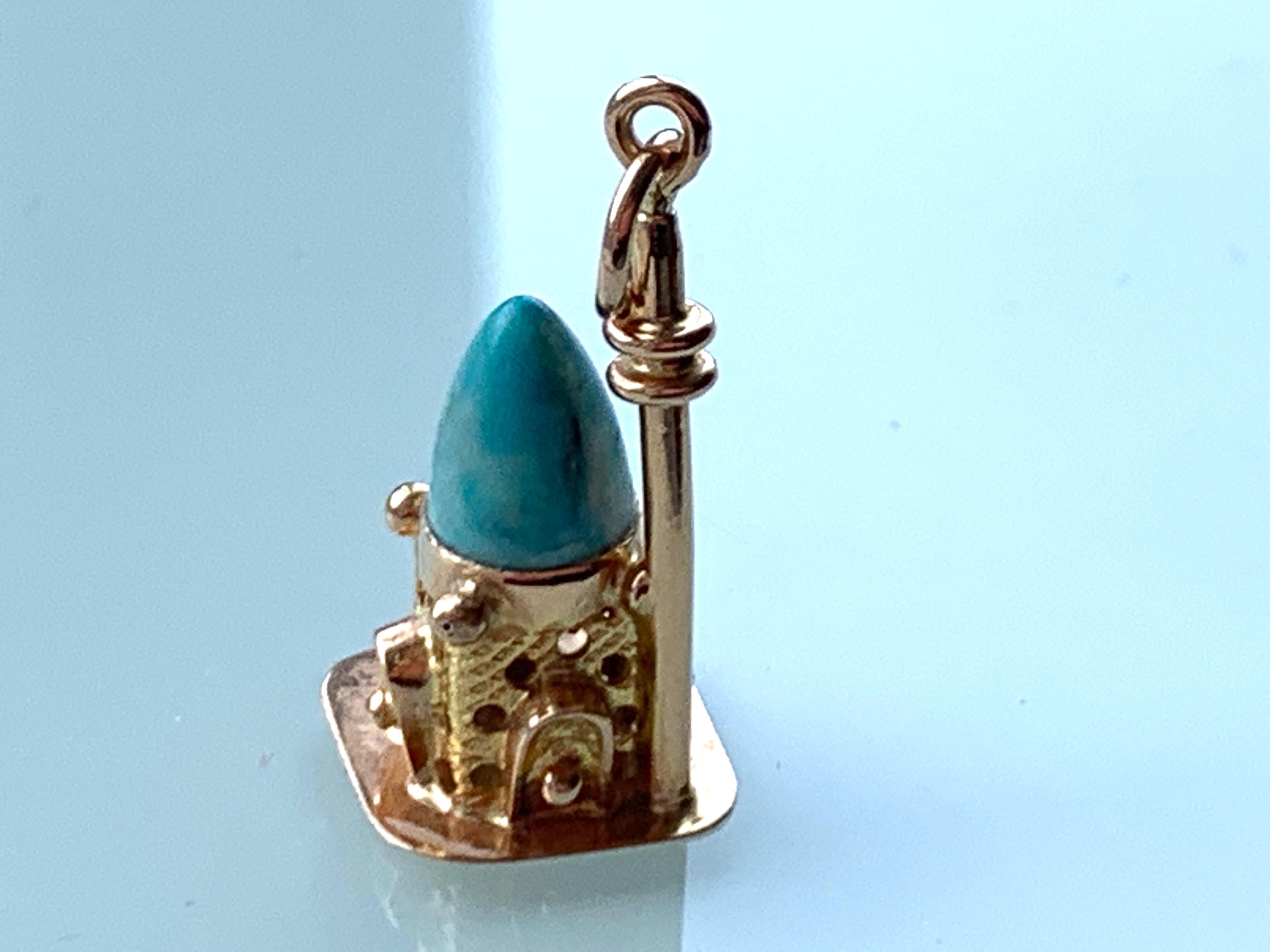Uncut 14ct Gold Temple Charm with Turquoise Stone For Sale
