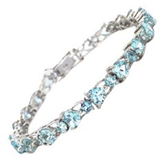 Bracciale con cuore e acquamarina rotonda fatto a mano in 14 ct. Sorpresa per la festa della mamma in A. Silver