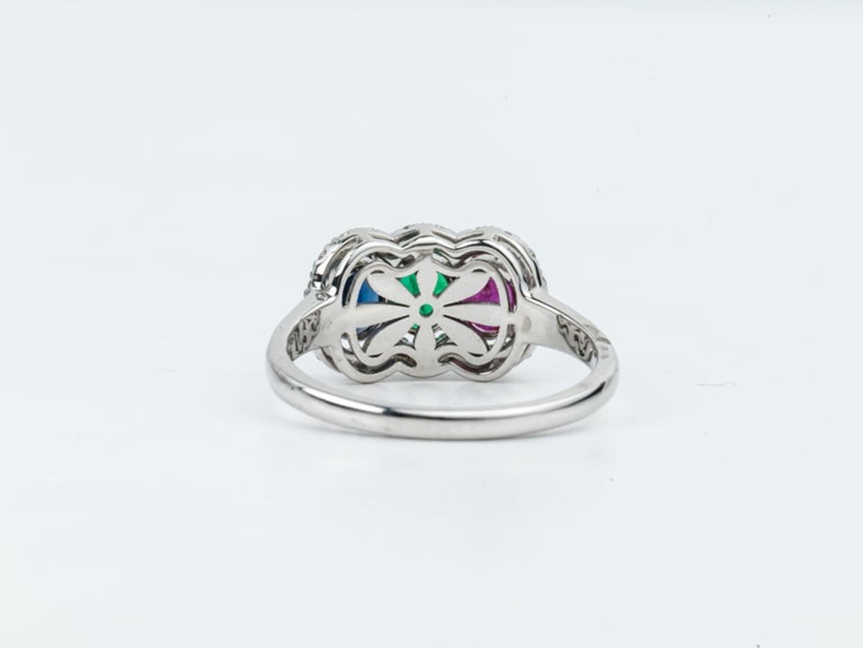 Oval Cut 1.4tcw Oval Emerald, Sapphire, Ruby & Diamond Halo Three Stone Engagement Ring For Sale