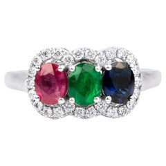1.4ct Oval Emerald, Blue Sapphire, Ruby Diamond Halo Three Stone Engagement Ring