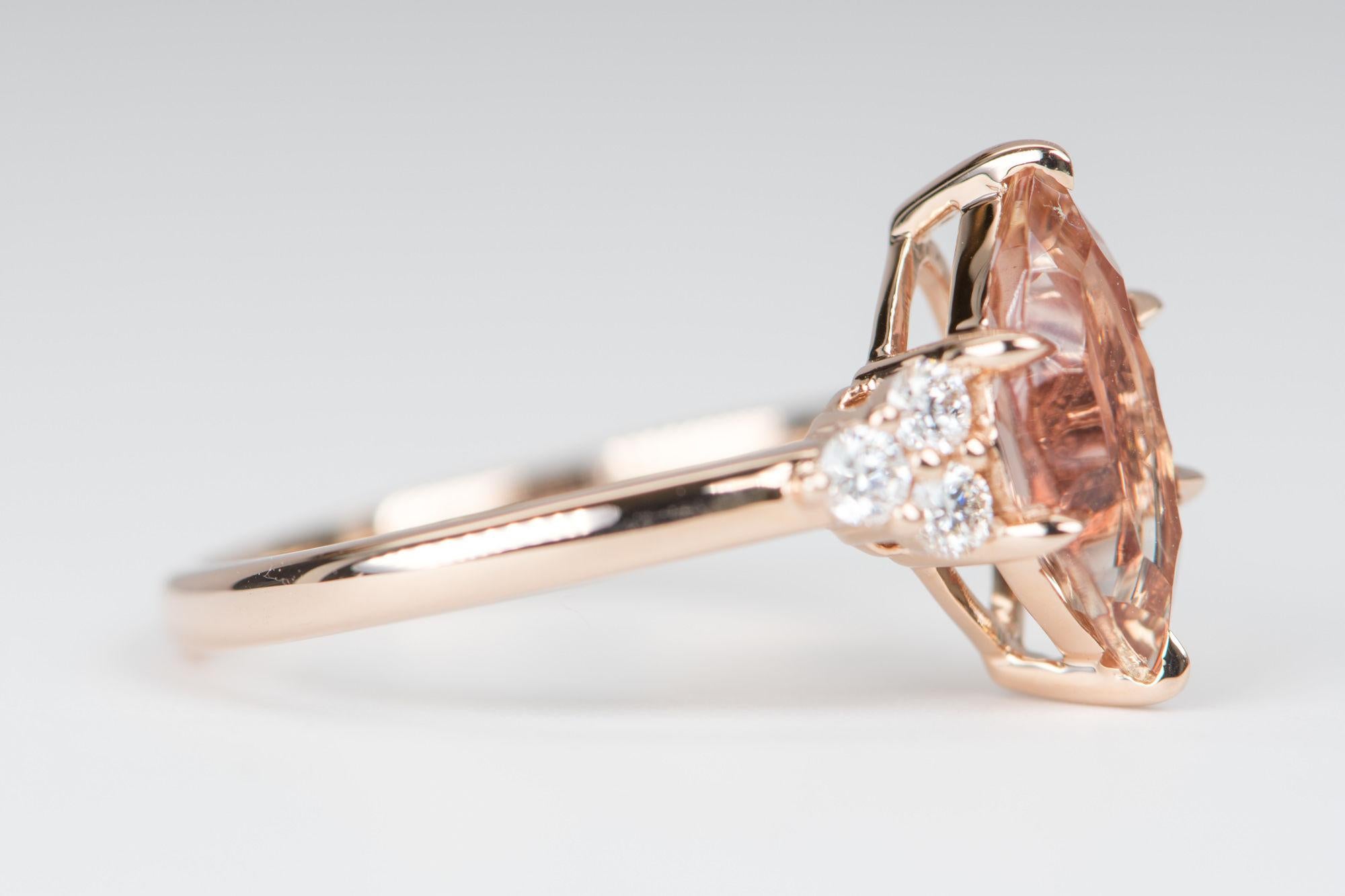 ♥ 1.4ct Red Orange Oregon Sunstone with Diamond Trio 14K Rose Gold Engagement Ring
♥ Solid 14k rose gold ring set with a beautiful marquise-shaped oregon sunstone
♥ Gorgeous red orange color!
♥ The item measures 12.6 mm in length, 13.5 mm in width,
