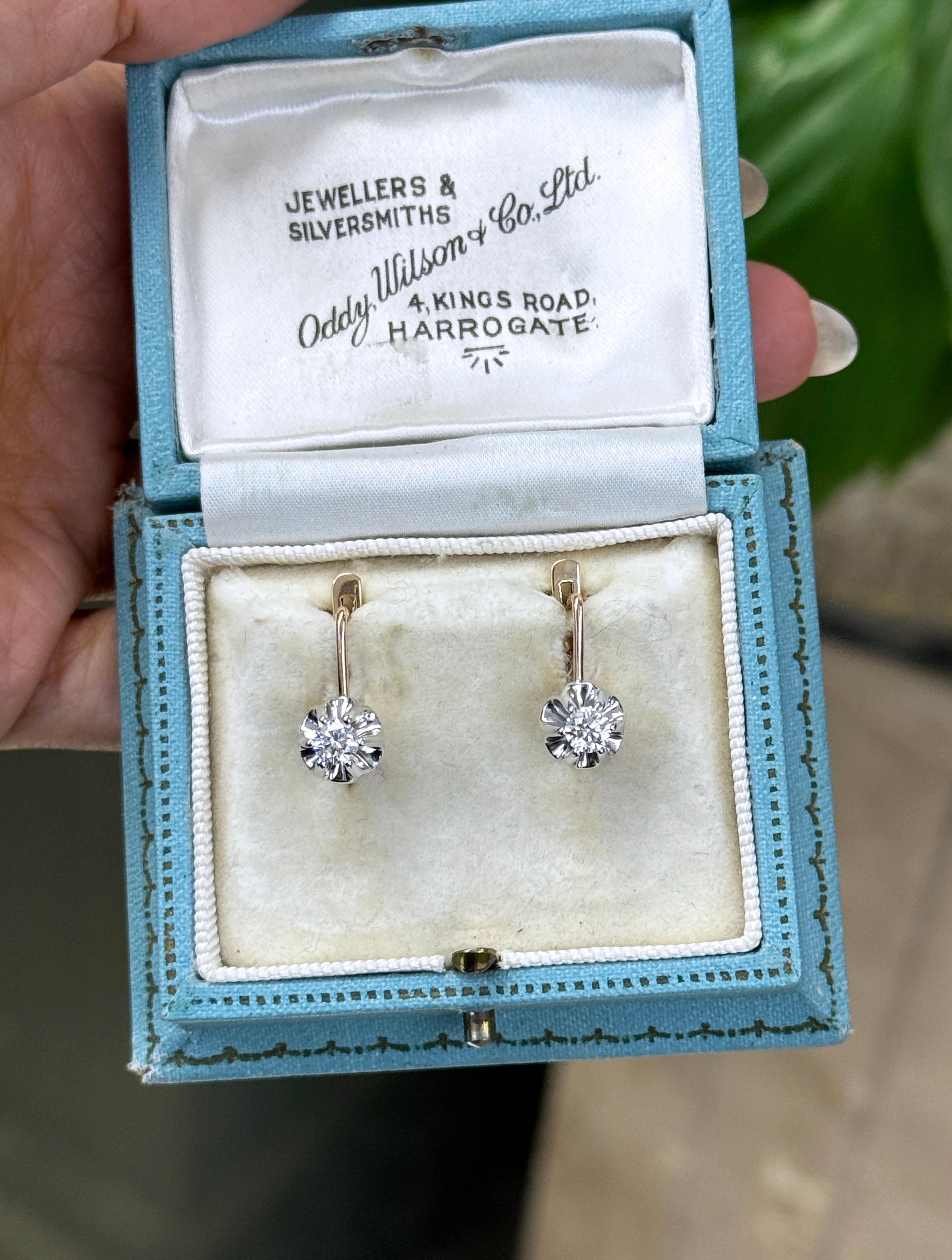 These beautiful diamond drops really are the all occasion earrings that go with everything.

Two fine quality round brilliant cut diamonds, weighing a total of 0.54 carats, are carefully held in stunning white gold illusion settings. The settings