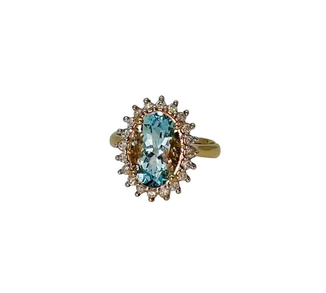 This exquisite ring features a mesmerizing oval faceted 2.62 carat Aquamarine gemstone know for its serene blue hue and captivating sparkle.  The Aquamarine is carefully set in a 14ct rose gold half round band adding a touch of warmth and romance to