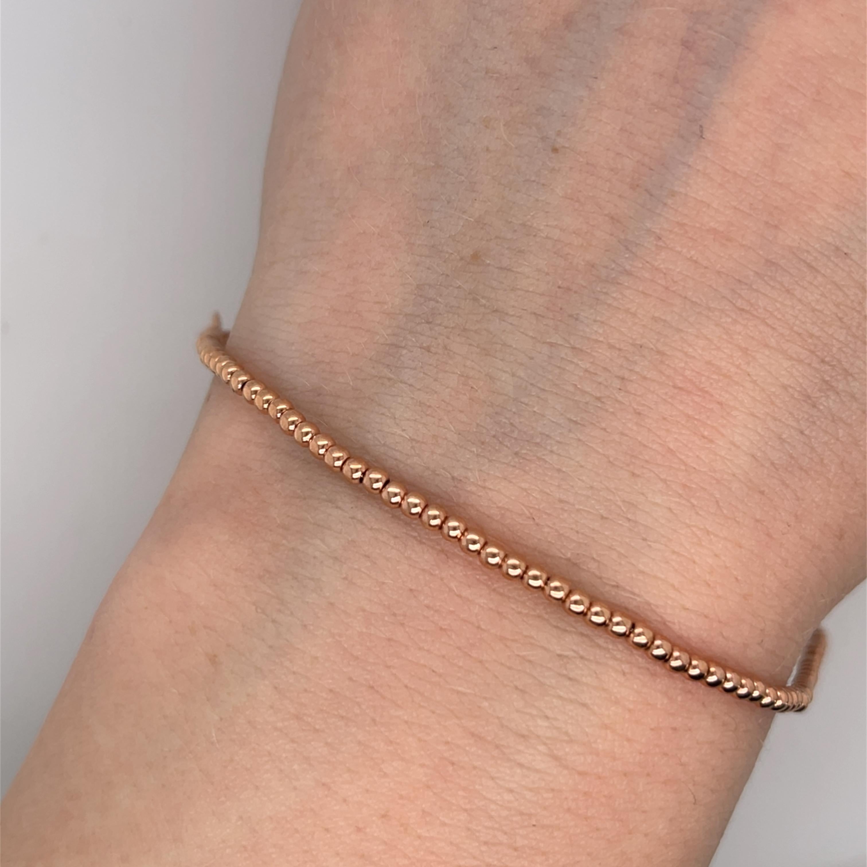 A delicate and stylish 14ct rose gold bead bracelet, weighing 2.93g. 
This timeless design features polished beads that create a sleek and modern aesthetic, perfect for everyday wear or layering with other pieces.
Item Length: 7.5
