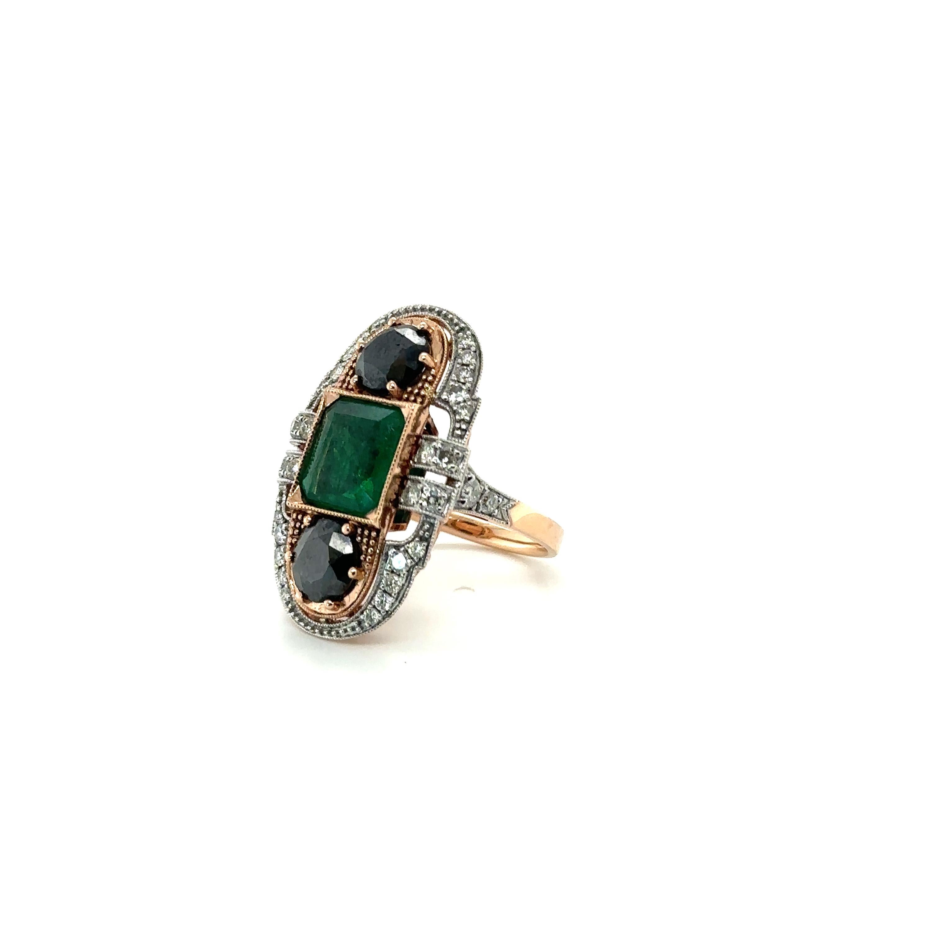 Contemporary 14ct Rose Gold Emerald, Diamond and Black Diamond Ring For Sale