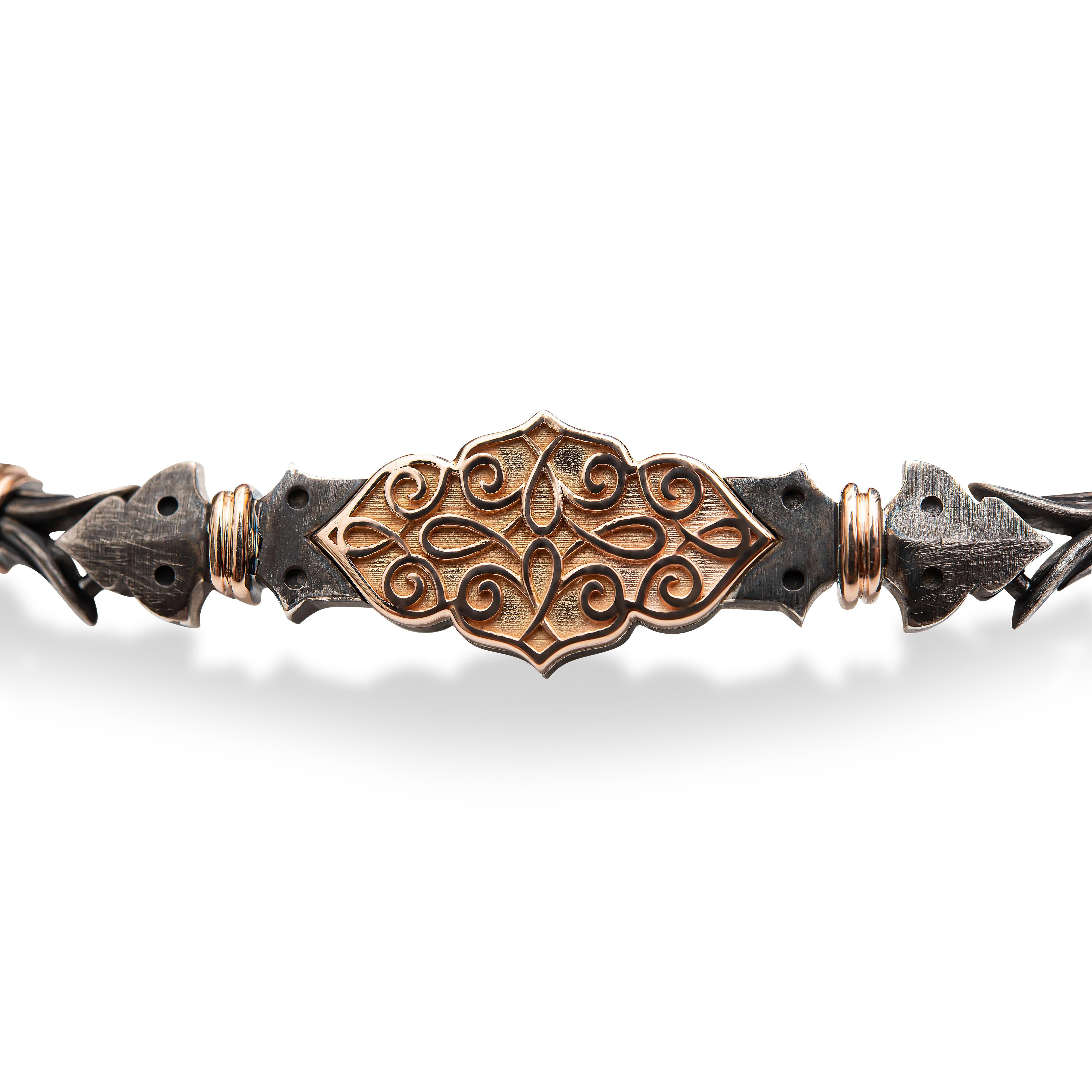 Say hello to this stunning handmade 14ct Rose Gold and Oxidized Sterling Silver, Filigree Pattern Work Linked Bracelet by Harlin Jones of New York. 

Bracelet Details: 
-19.5cm - 7.7 inches Length 
-11mm Width (Middle Rose Gold Section) 
-19mm x