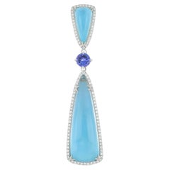 14ct Sky Blue Topaz, Tanzanite and Diamond Studded Pendant in 14karat White Gold