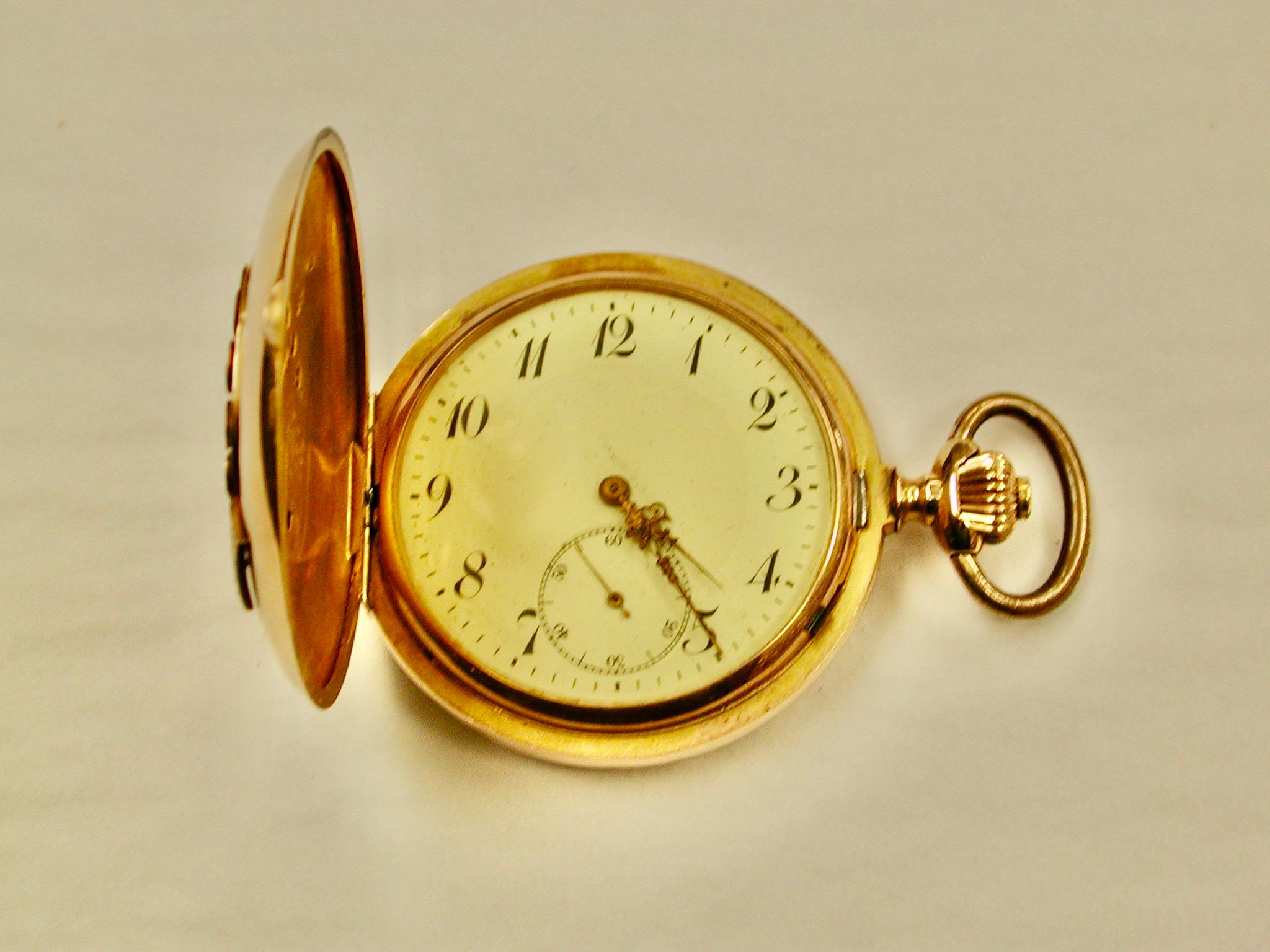14ct Swiss Gold Hunter Watch,Whip & Horseshoe,Diamonds and Rubies,c1890
Lovely Hunter Pocket watch set with graduated diamonds in the horeshoe and rubies in  the whip on 
the front.
The inside has a gold dust cover and underneath is the swiss