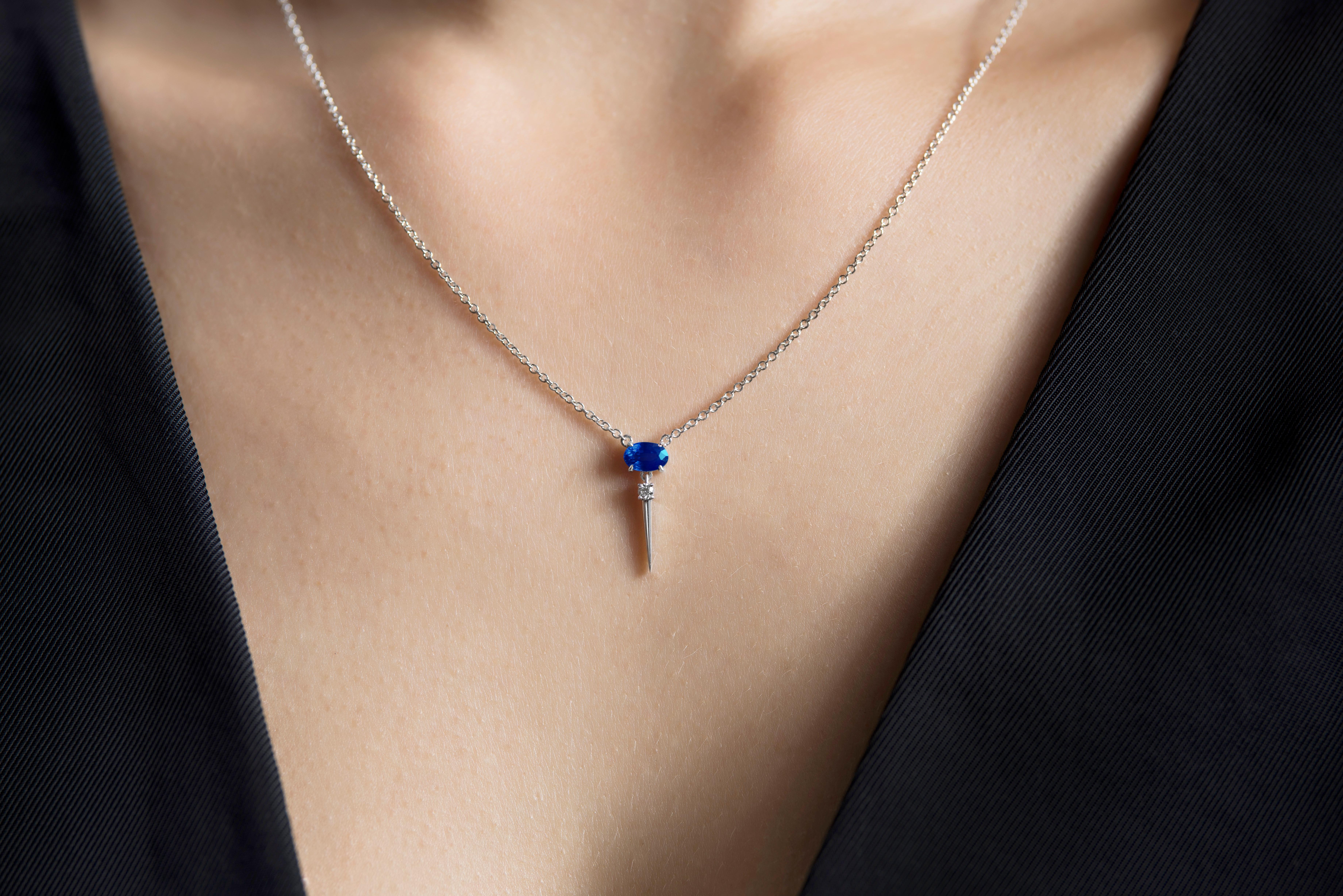 - Adjustable Cable Chain - Longest at 18inches (45cm)
- Approx 18mm long x 6mm wide
- Oval Shape Blue Sapphire 6mm x 4mm 
- Blue Sapphire Total Carat Weight 0.50ct Approx
- 1 x Round Brilliant Cut Diamond F-VS 0.03ct
- Total Gold Weight Approx