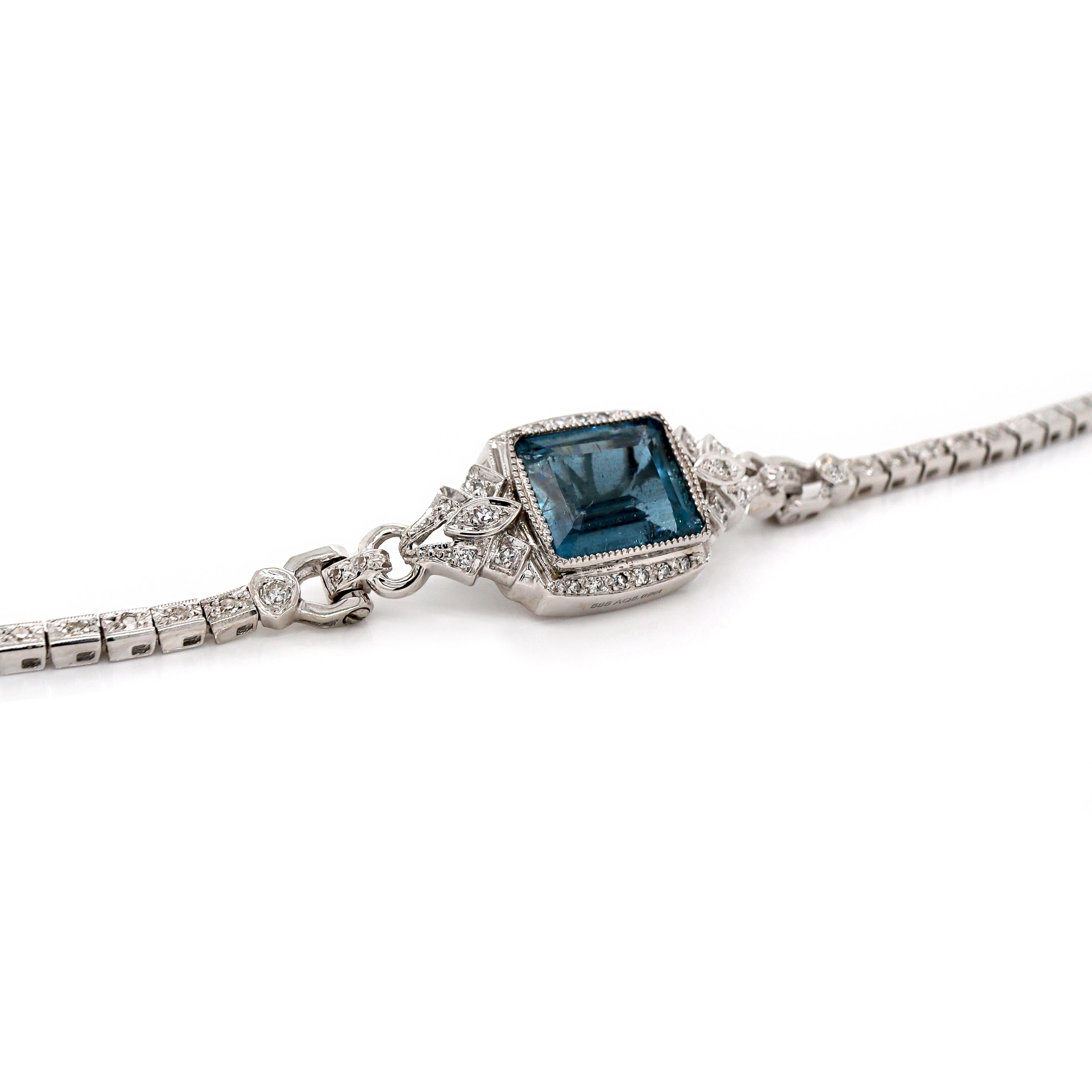 14CT White Gold Aquamarine And Diamond Bracelet

At the center focus of this Art Deco bracelet is an emerald cut Aquamarine in striking luminous blue hue as clear and serene as the waters of a tropical sea. Flanking the central stone are