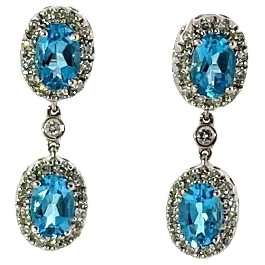 14ct White Gold Blue Topaz & Diamond Halo Drop Earrings For Sale