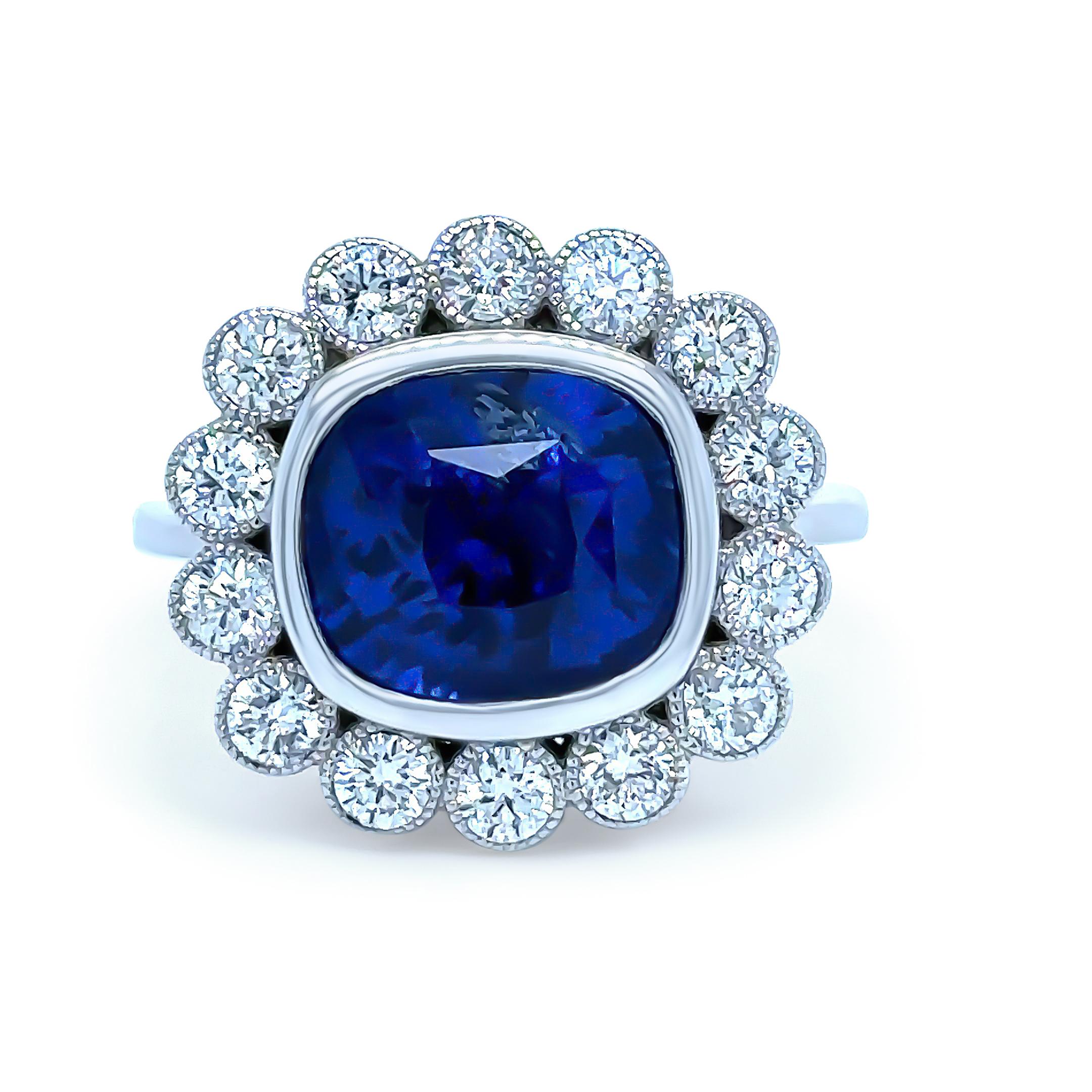 A Ceylon Sapphire & Diamond Ring, made of 14ct White Gold. Featuring a 7.24ct Ceylon Sapphire, Cut Rectangular Cushion Faceted, Blue Colour, Slightly Included Clarity.

Additionally set with 14 Round Brilliant Cut Diamonds I-K Colour, SI1-P1 Clarity
