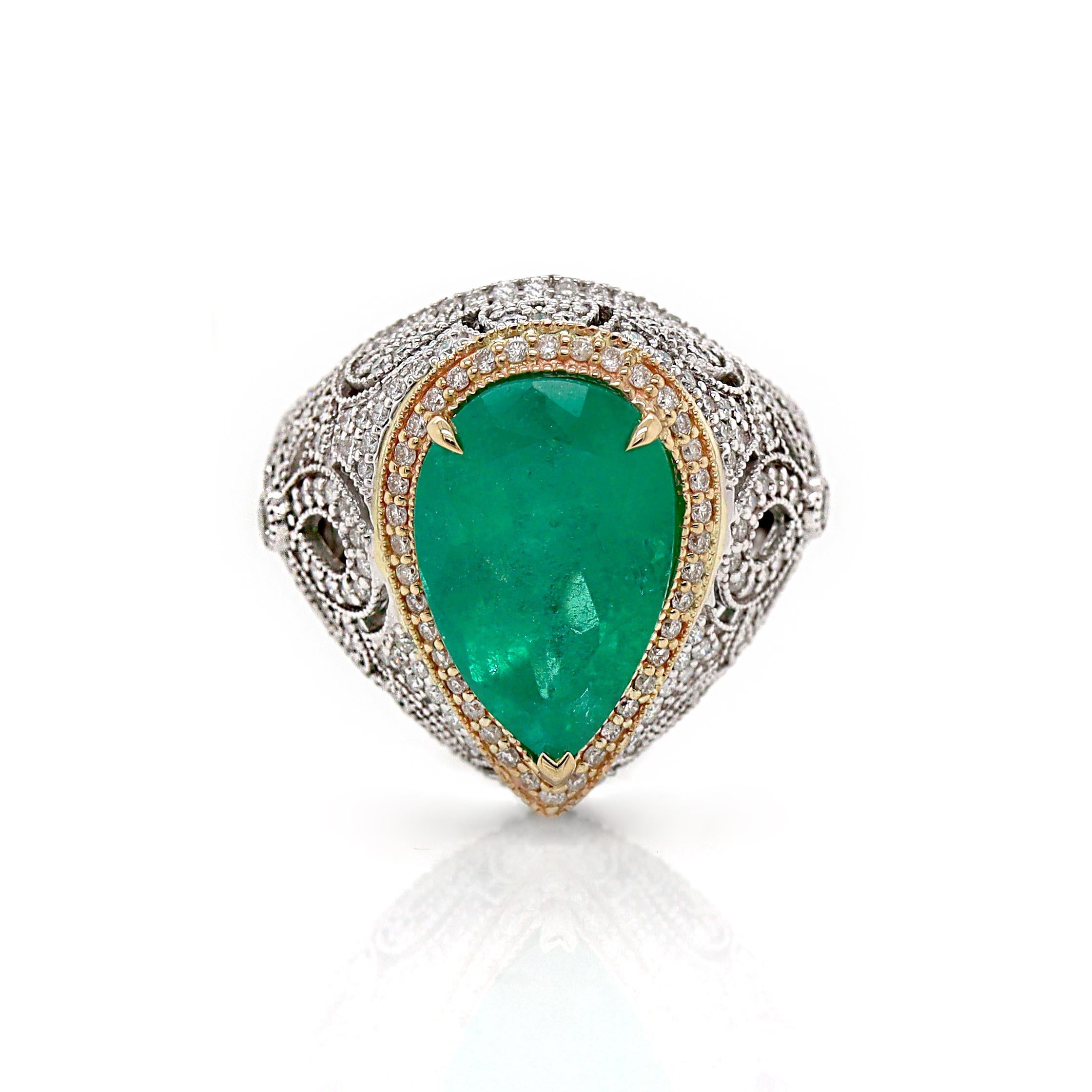 14CT White Gold Colombian Emerald And Diamond Cocktail Ring

A cocktail ring combining the opulence of a pear cut Colombian Emerald in deep rich green color with exceptional clarity, set along with 247 round brilliant cut dazzling diamonds, an