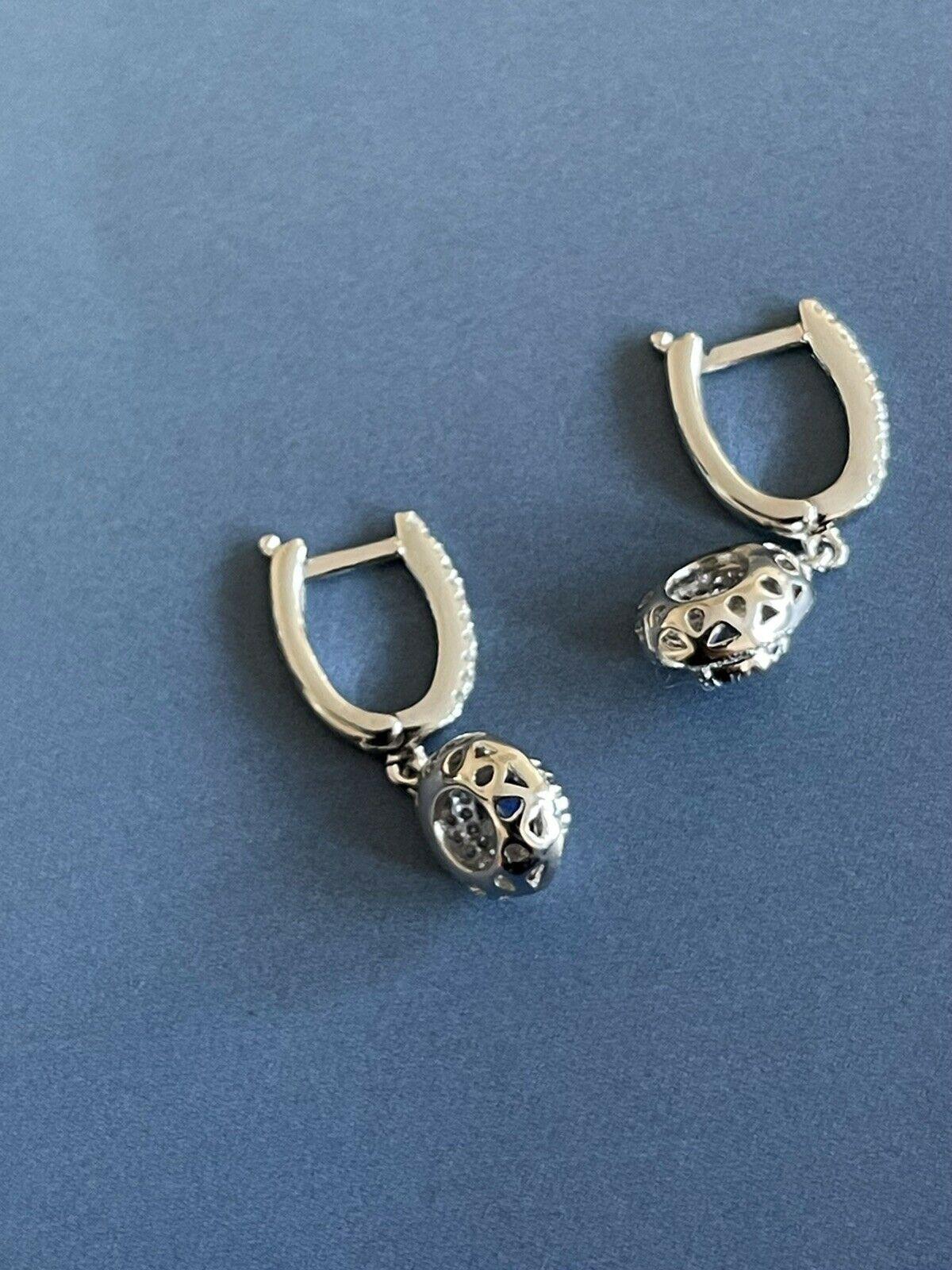 

Sapphire and Diamonds, a Classic British fine jewellery favourite combination

Very elegant 14ct White gold diamond hoop earrings - hallmarked

It ll make perfect present for someone special or girls who want to treat themselves

0.60ct+