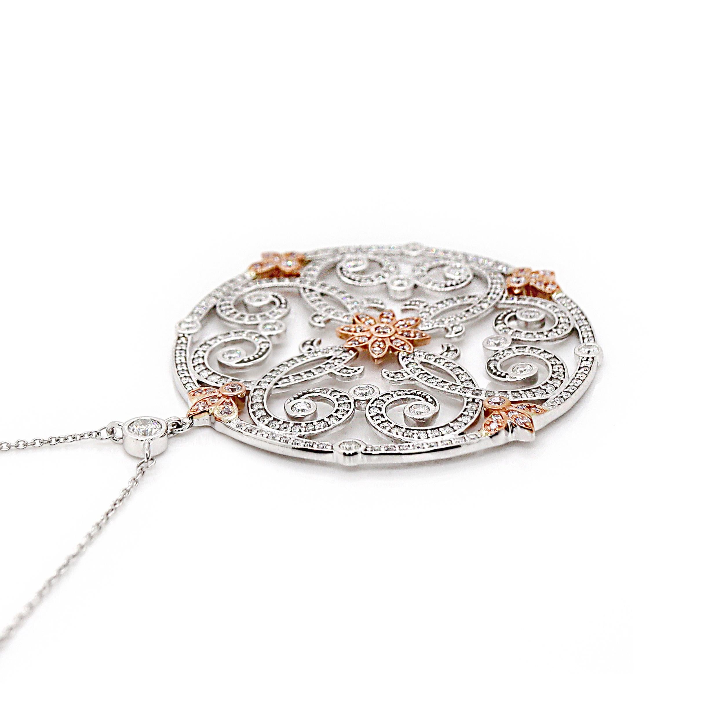 14CT White With Rose Gold Pink And White Diamond Antique inspired Pendant With Necklace

An antique inspired pendant featuring 45 round brilliant cut pink diamonds and 277 round brilliant cut white diamonds, evoking the elegance and timeless beauty