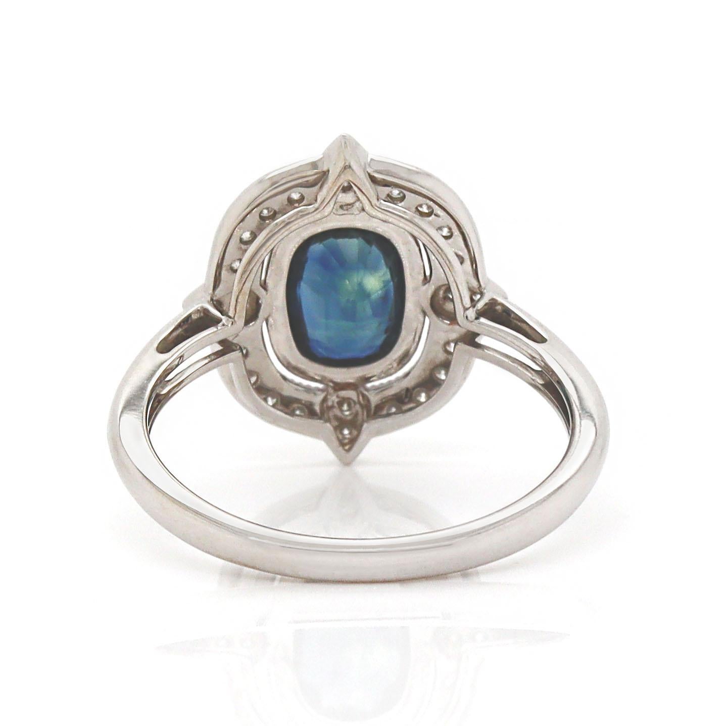 14CT White Gold Sapphire & Diamond Ring

This Art Deco-style ring features a captivating 1.43ct blue sapphire at its center, surrounded by intricate diamond accents set in 14ct white gold. The geometric design, characteristic of the Art Deco era,