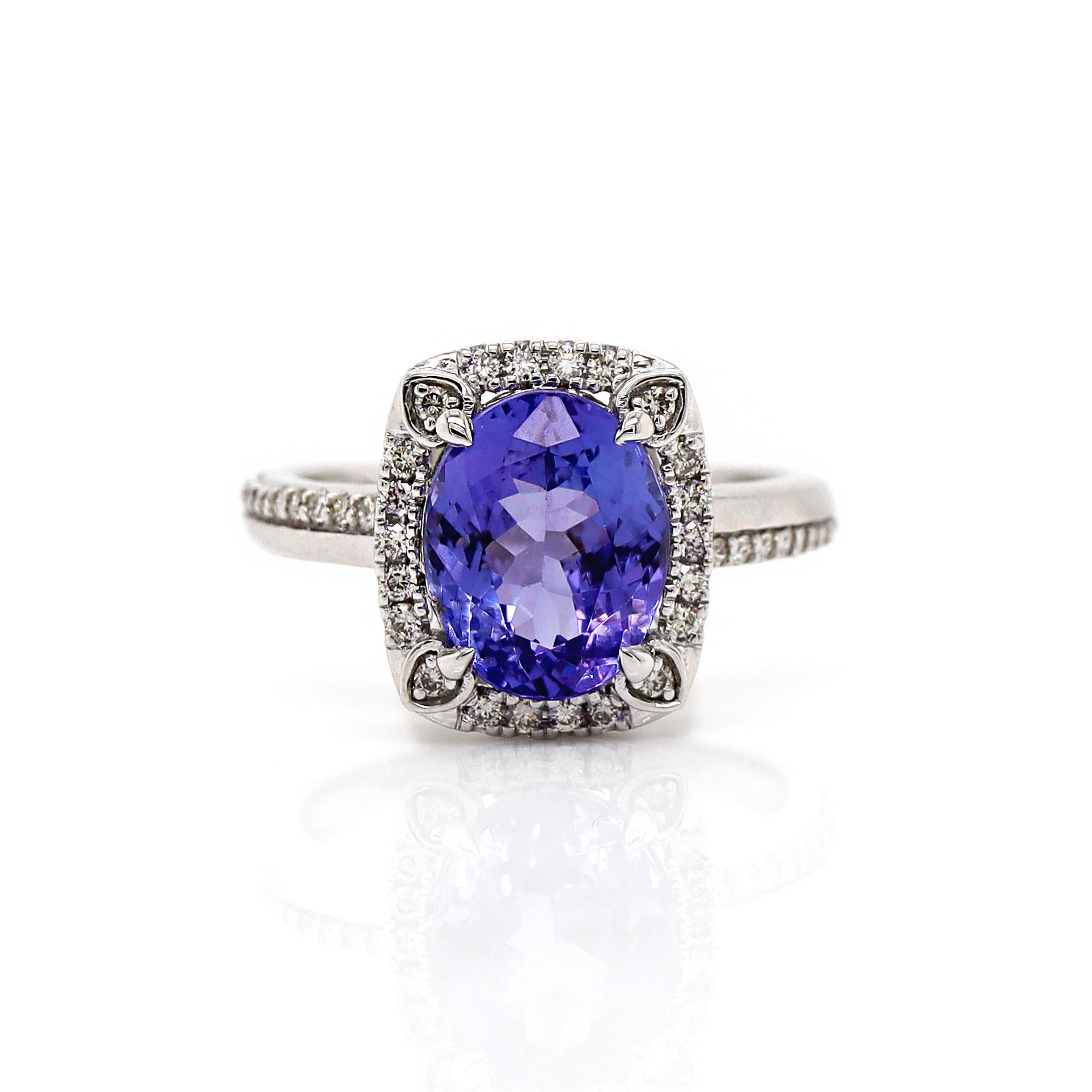 14CT White Gold Tanzanite And Diamond Dress Ring

This dress ring showcases a stunning an oval cut rich blue violet hue Tanzanite at the central, surrounded by a sparkling halo of round brilliant cut diamonds, enhance the beauty of the central