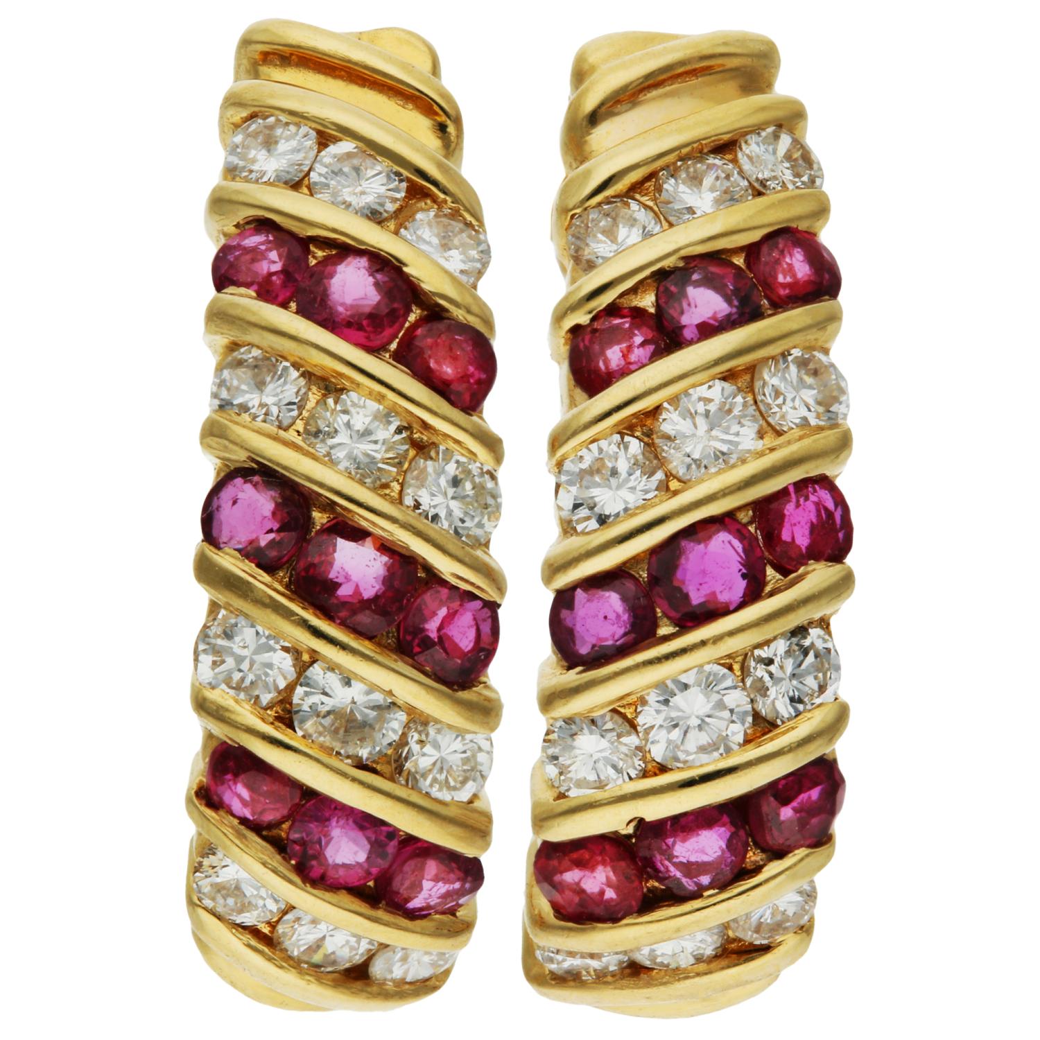 14ct Yellow Gold 0.60ct Ruby & 0.70ct Diamond Earrings

Elevate your elegance with our Pair of Pre-Owned 14ct Yellow Gold Ruby & Diamond Earrings, a striking display of timeless beauty and sophistication. Each earring is a graceful curve of 14ct