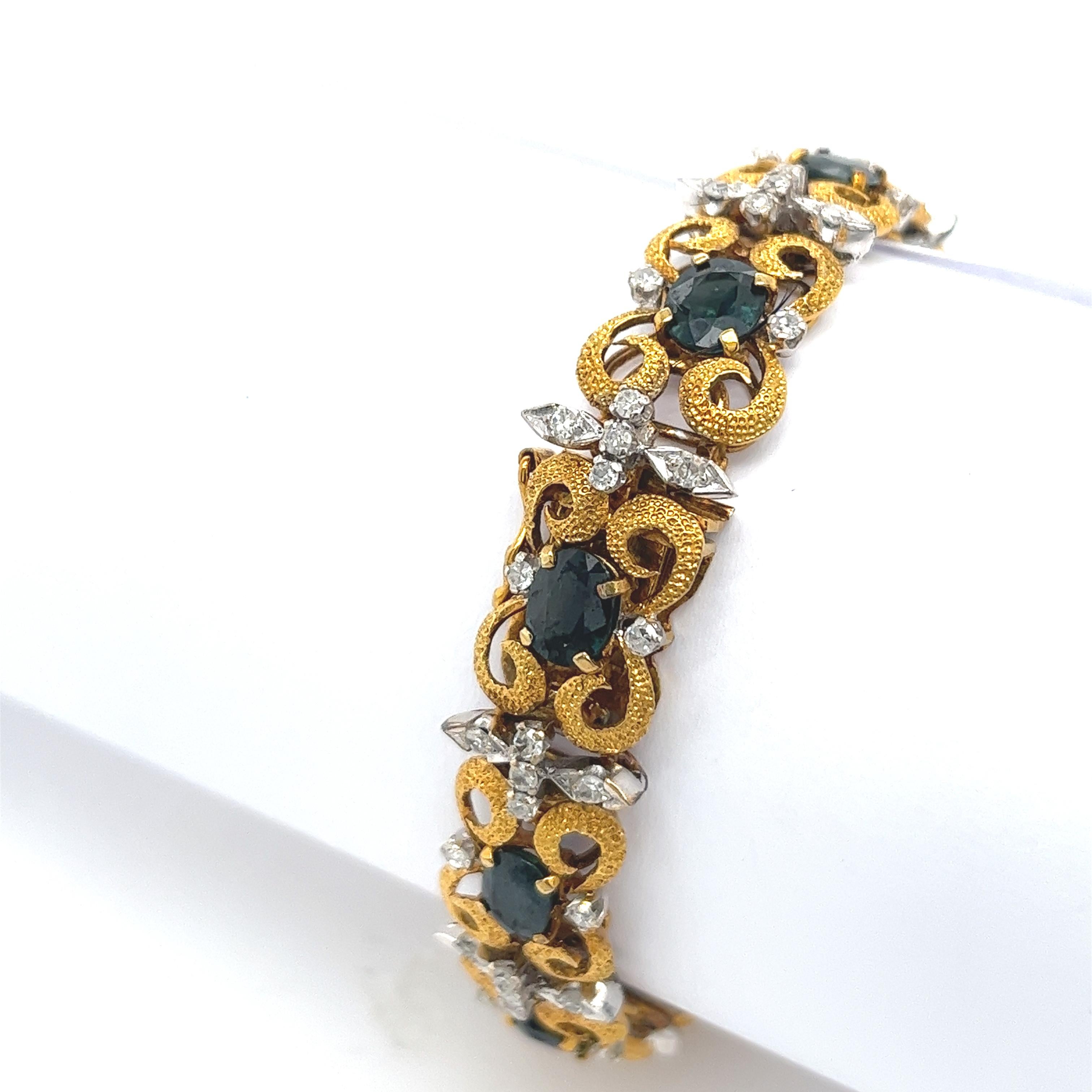 A beautiful vintage sapphire bracelet, crafted in 14ct yellow gold and set with 1.20ct rose-cut diamonds and 10 oval natural sapphires, 7.50ct. It is a timeless piece of jewellery, which you can wear day or night.
Item Length: 7