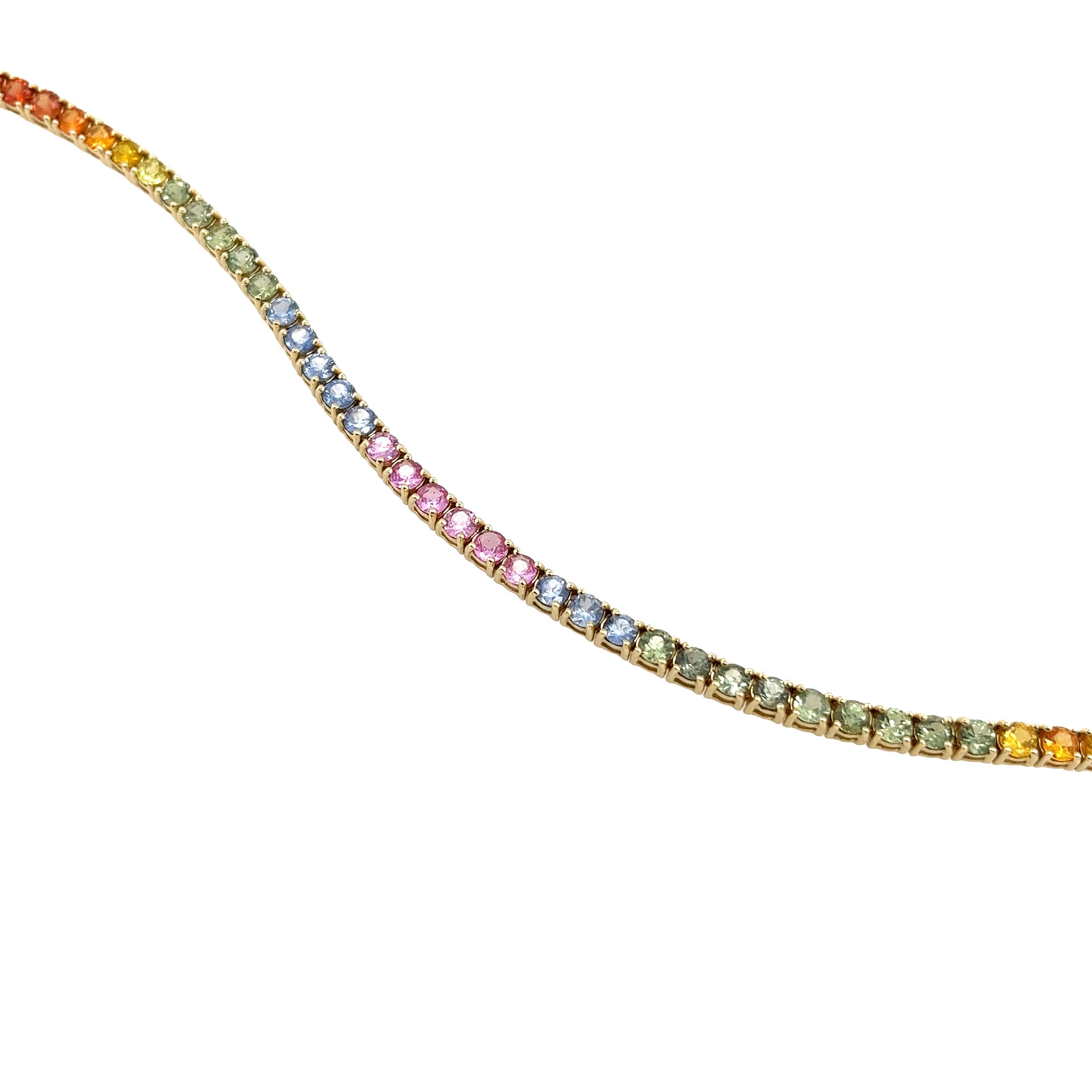 This bracelet is made of 14ct yellow gold and set with 51 round natural round multicolor sapphires, and has a beautiful finish. This design is ideal for everyday wear.

Total Sapphire Weight: 8ct
Total Weight: 9.61g
Bracelet Length: 7.5
