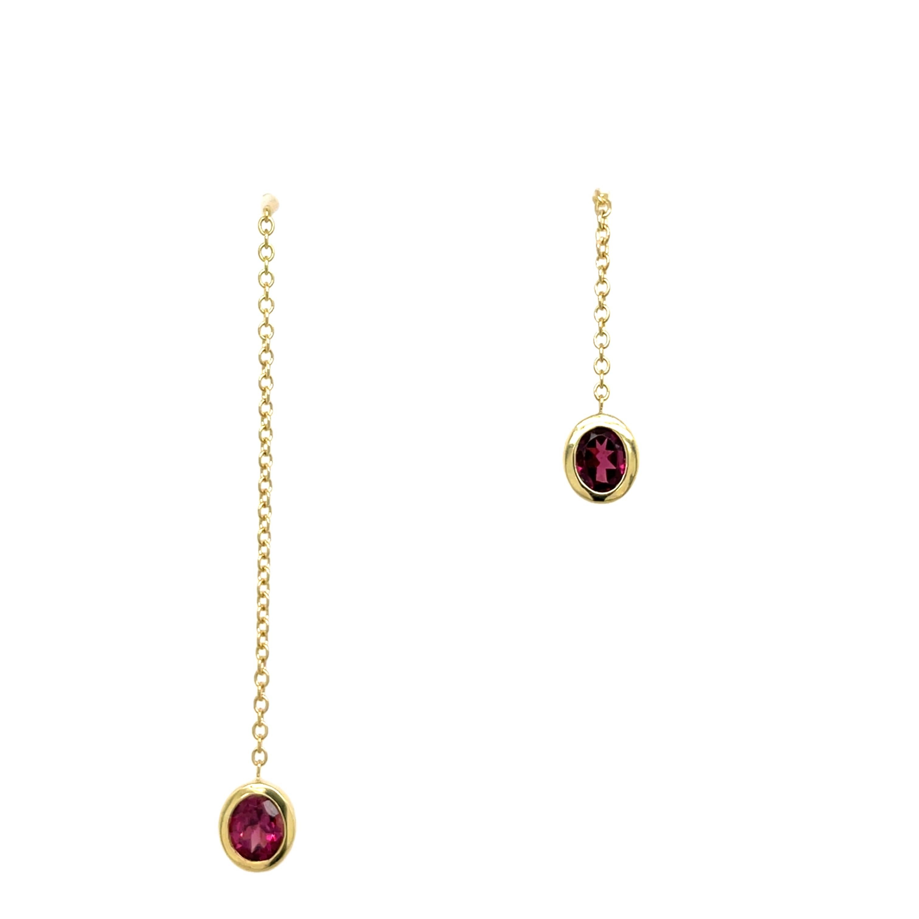 Elegant 14ct yellow gold chain earrings, featuring 2 oval rubies. The vibrant red rubies stand out beautifully
against the warm gold setting, making these earrings a striking addition to any jewellery collection. 

Total Weight: 1.70g
Earring