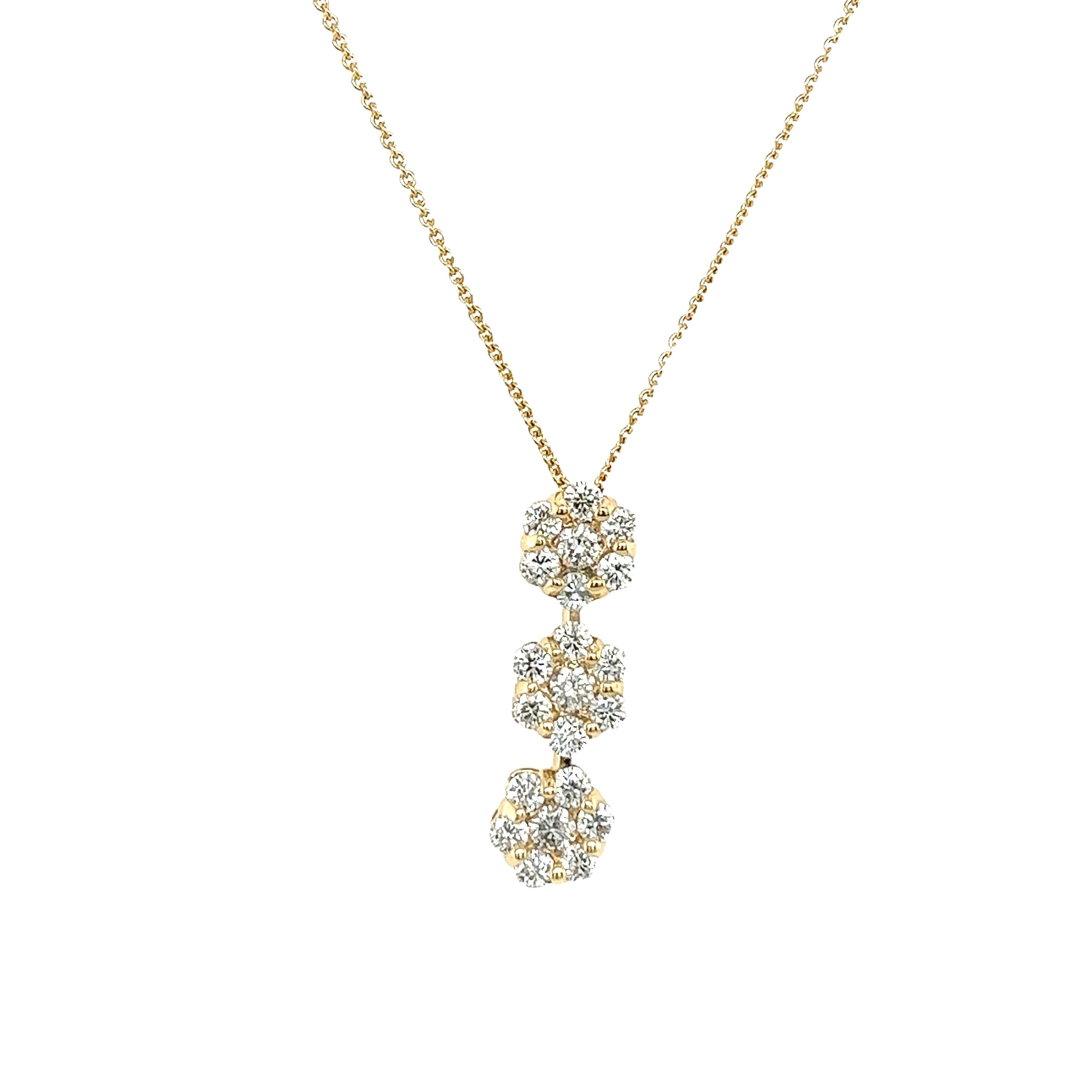 A true embodiment of elegance and sophistication.
This captivating piece showcases a stunning triple cluster diamond pendant with 21 dazzling round brilliant cut diamonds in 14ct yellow gold.This comes with a 14ct yellow gold 18” chain.
Total